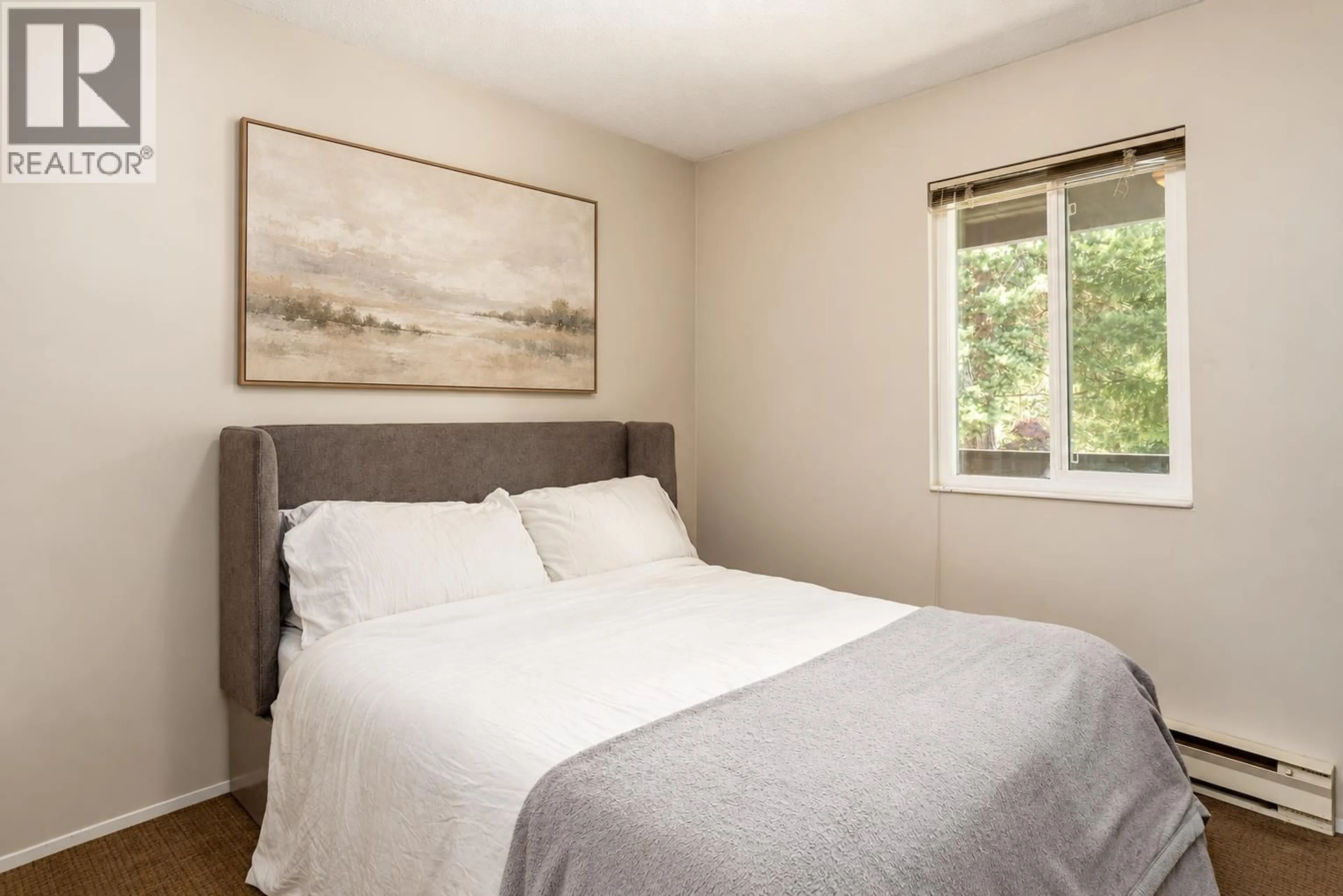 Bedroom with bed, wood/laminate floor for 7 - 7001 NESTERS ROAD, Whistler British Columbia V8E0X1