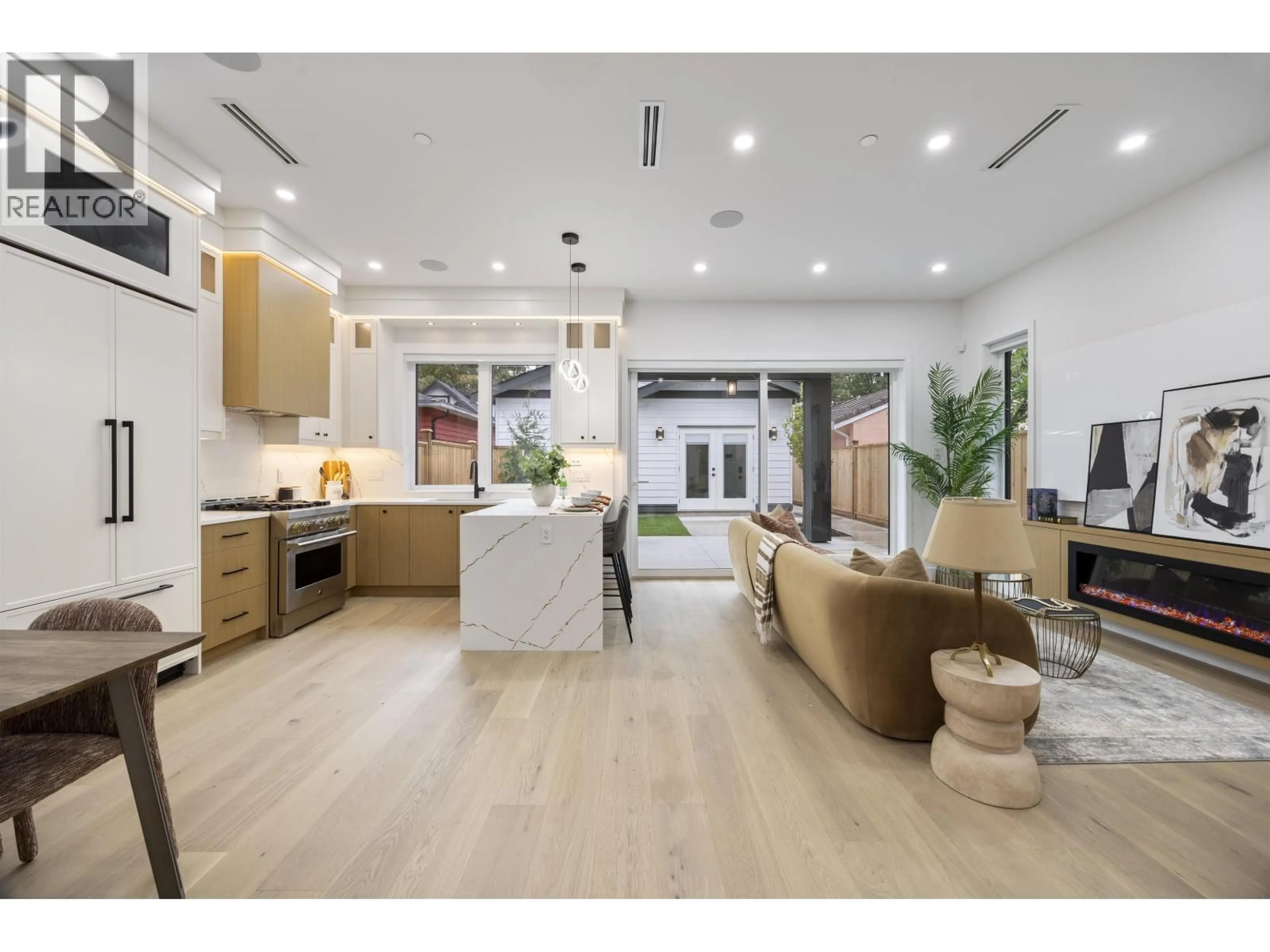 Open concept kitchen, wood/laminate floor for 2 - 2070 26TH AVENUE, Vancouver British Columbia V5N2W4