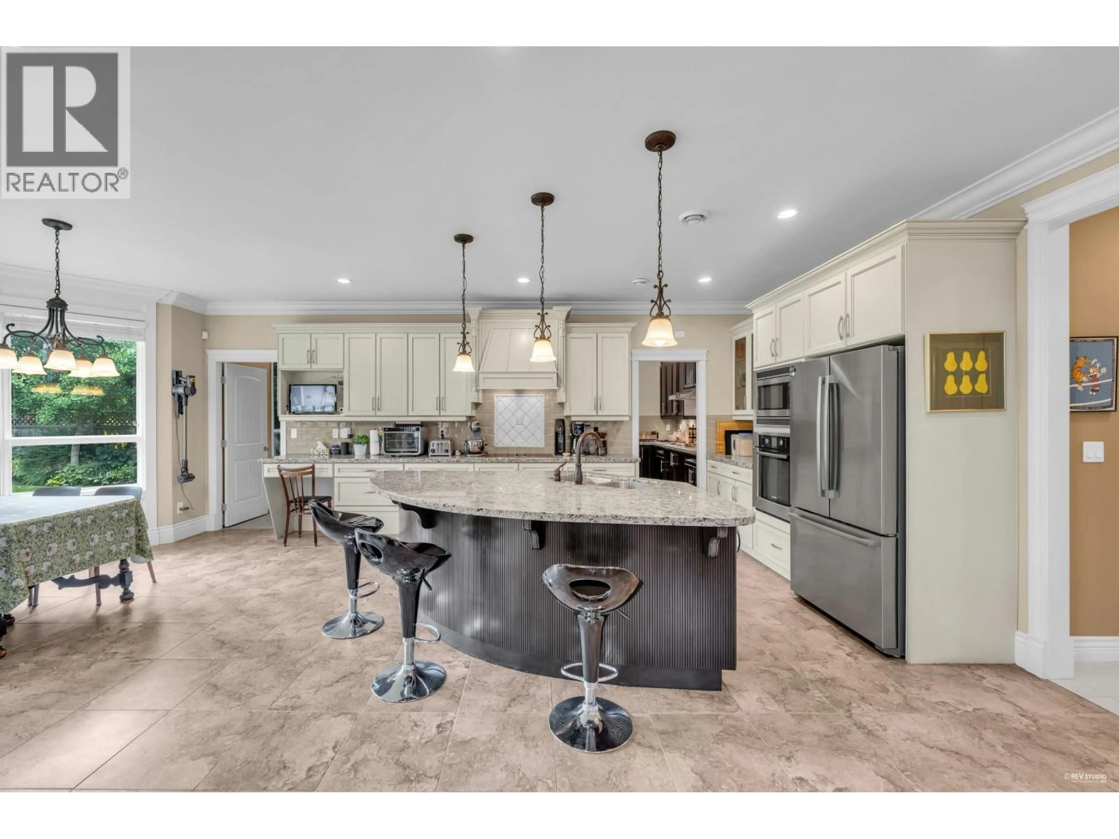 Open concept kitchen, ceramic/tile floor for 4931 PENDLEBURY ROAD, Richmond British Columbia V7E1E9