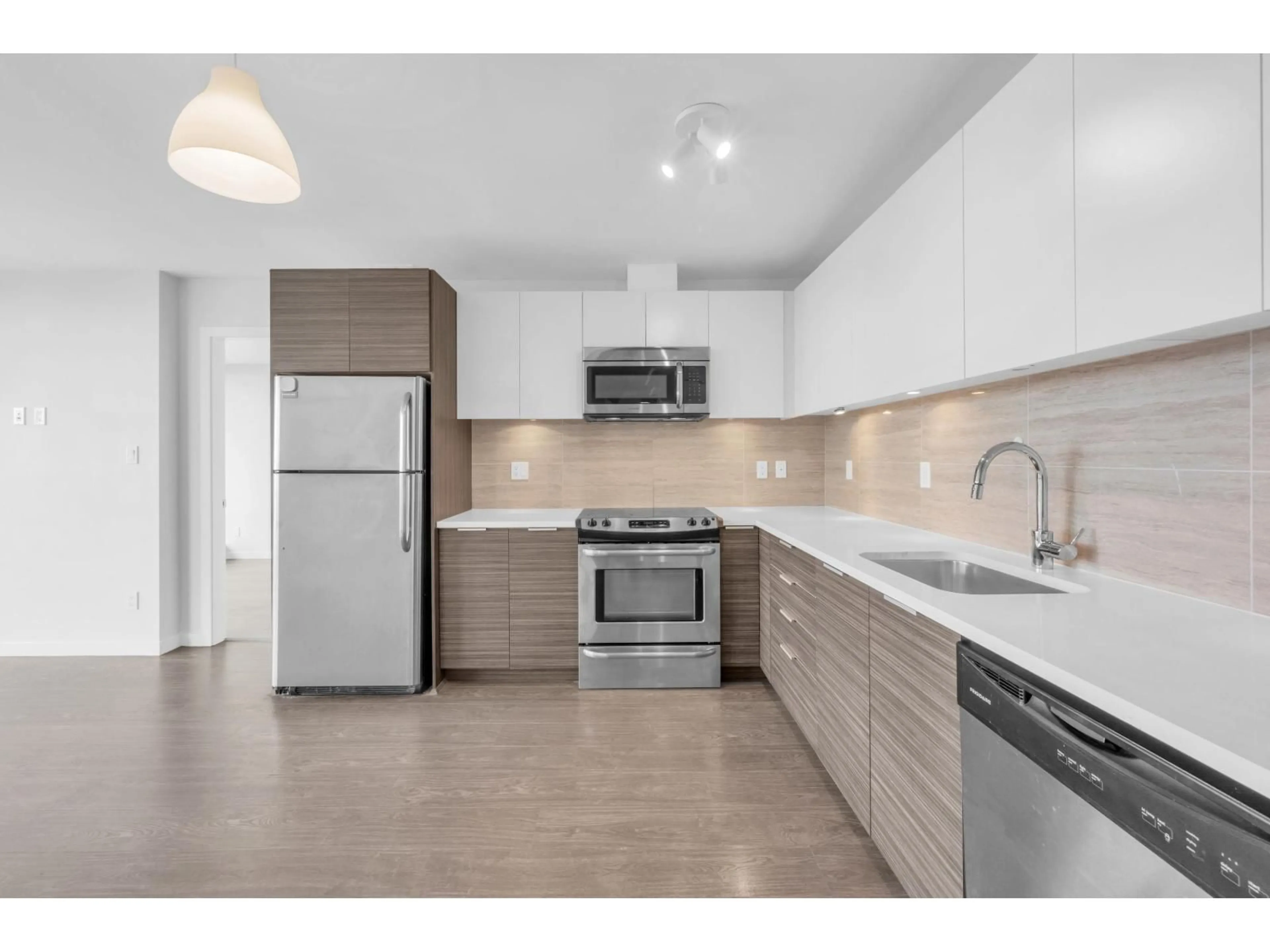 Open concept kitchen, ceramic/tile floor for 2109 - 13303 CENTRAL AVENUE, Surrey British Columbia V3T0K6