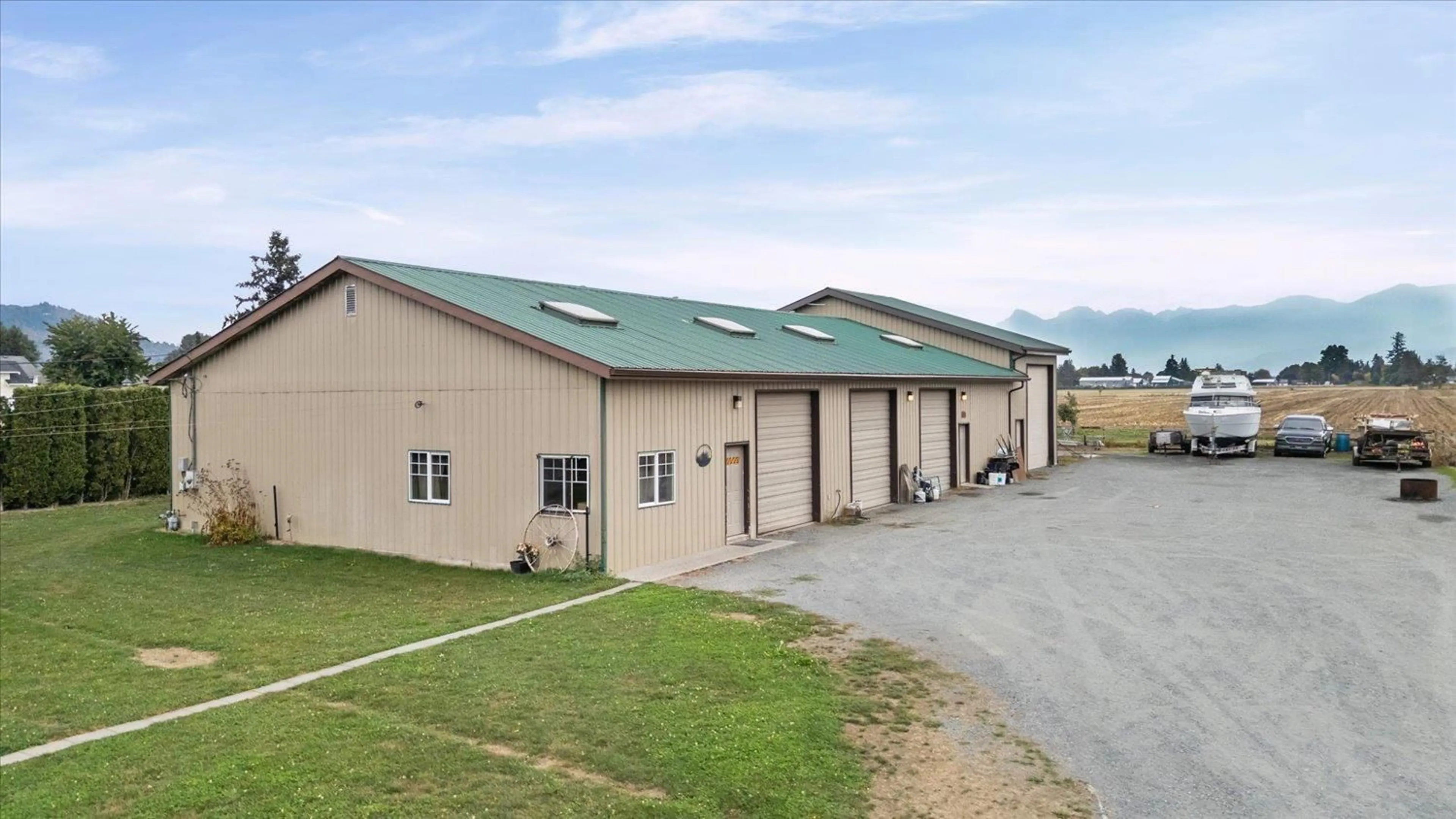 A pic from outside/outdoor area/front of a property/back of a property/a pic from drone, building for 6260 SUMAS PRAIRIE ROAD, Sardis - Greendale British Columbia V2R4N6