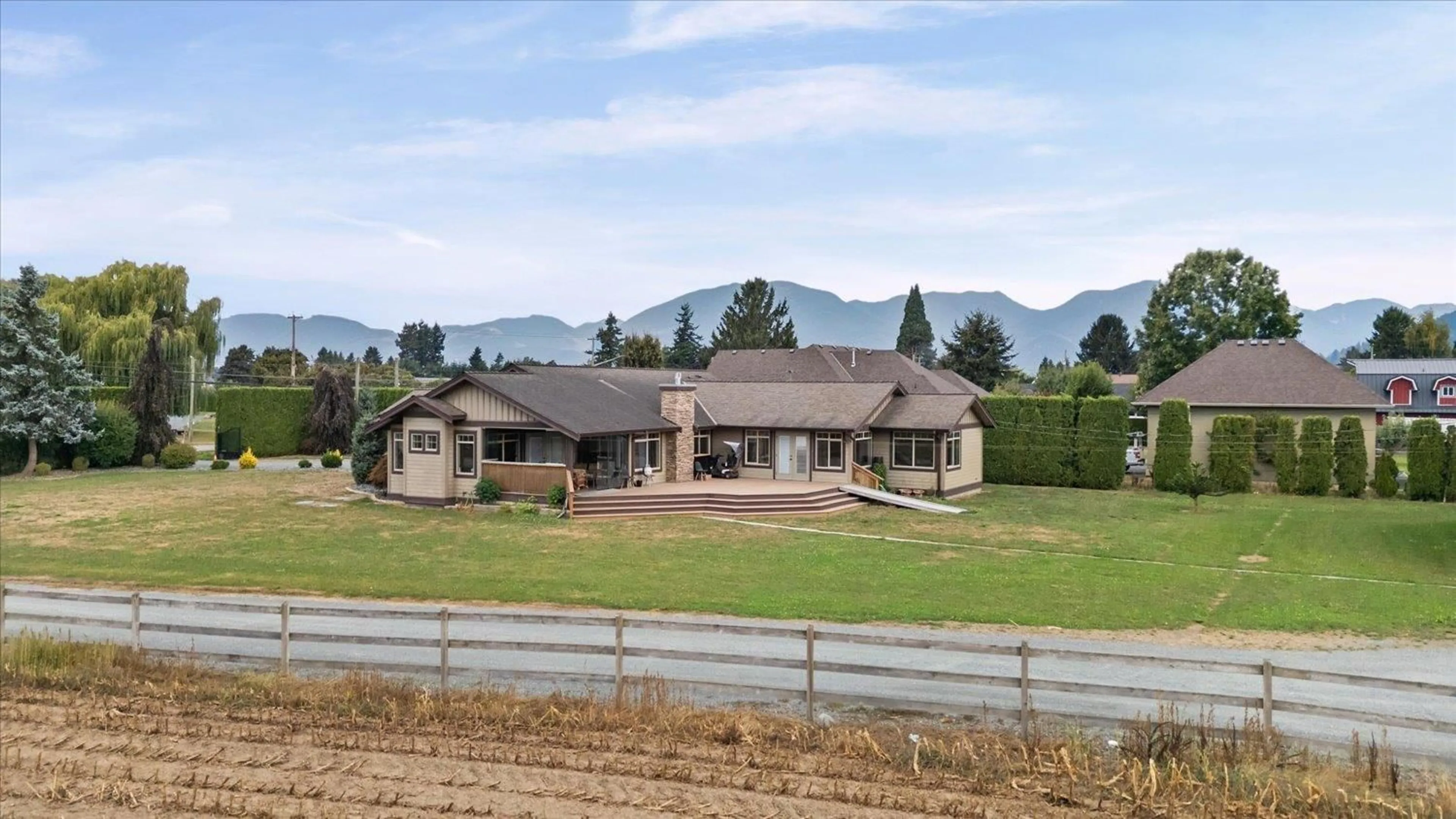 A pic from outside/outdoor area/front of a property/back of a property/a pic from drone, mountain view for 6260 SUMAS PRAIRIE ROAD, Sardis - Greendale British Columbia V2R4N6