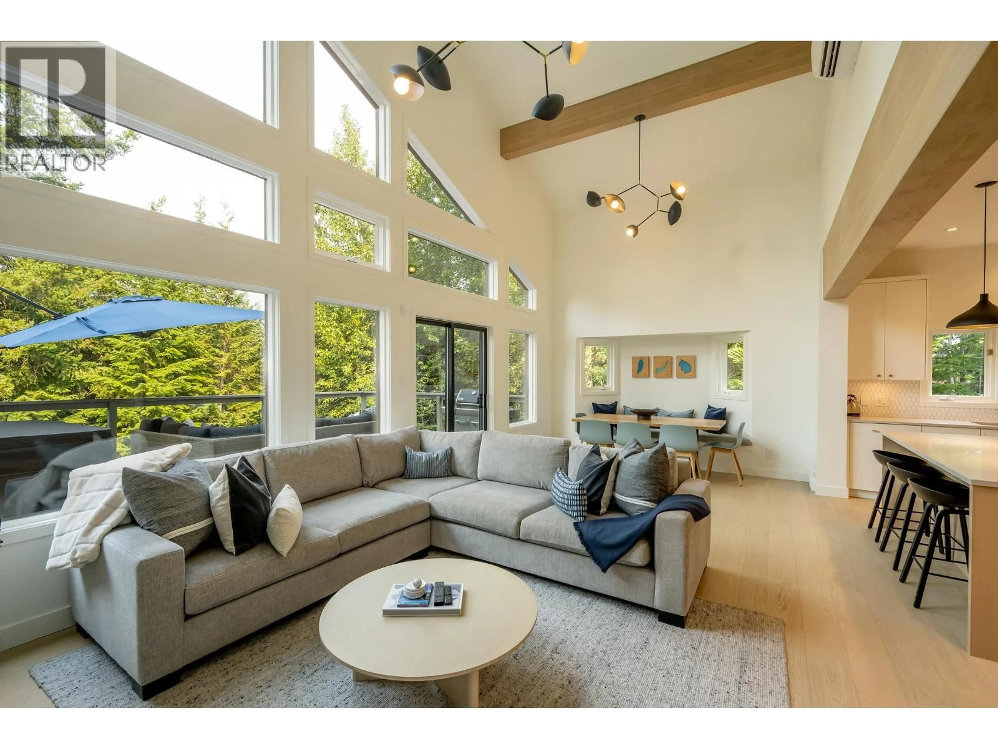 Living room with furniture, wood/laminate floor for 6260 EAGLE DRIVE, Whistler British Columbia V8E0C7