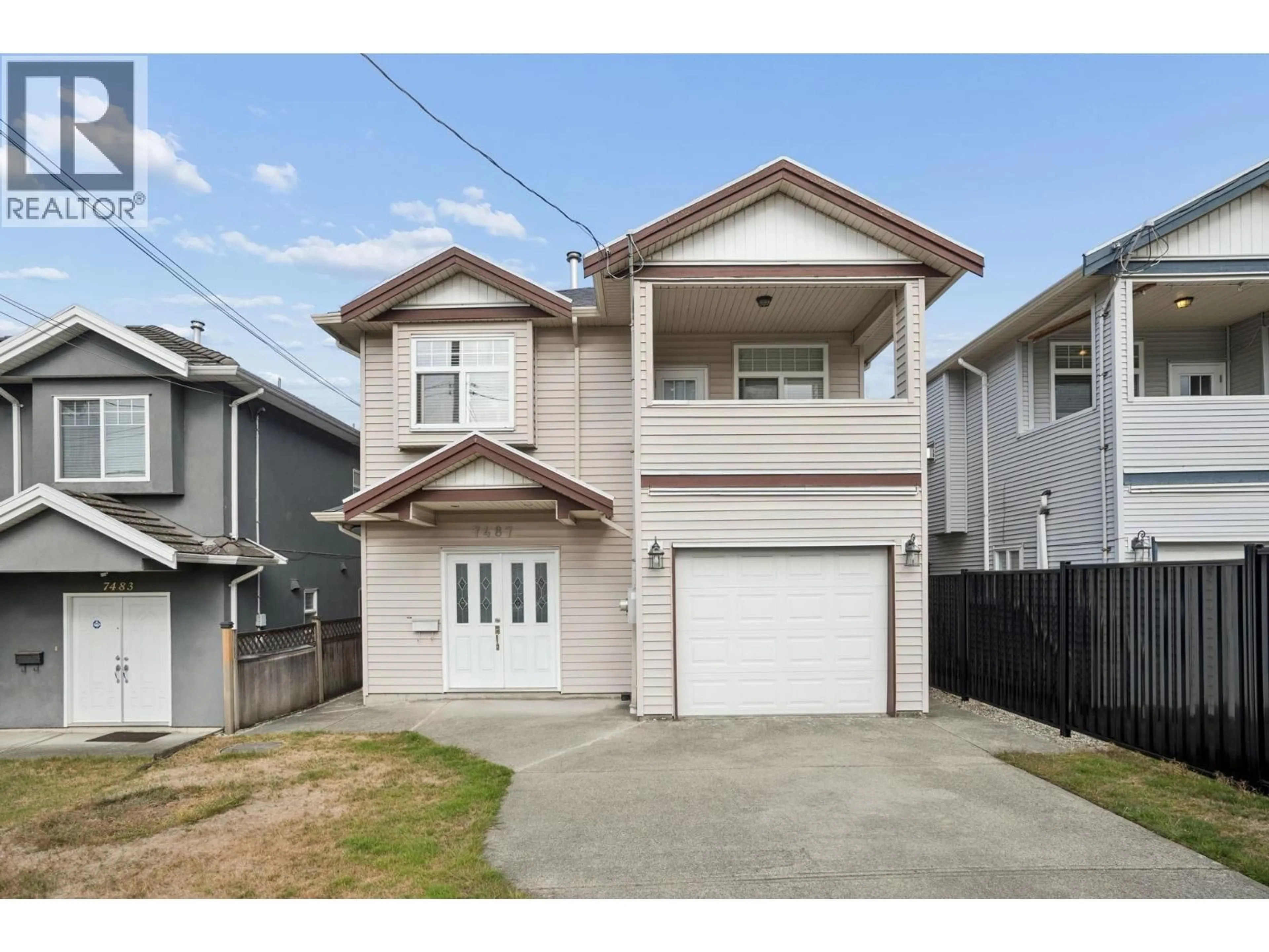 Home with vinyl exterior material, street for 7487 ROSEWOOD STREET, Burnaby British Columbia V5E2G6