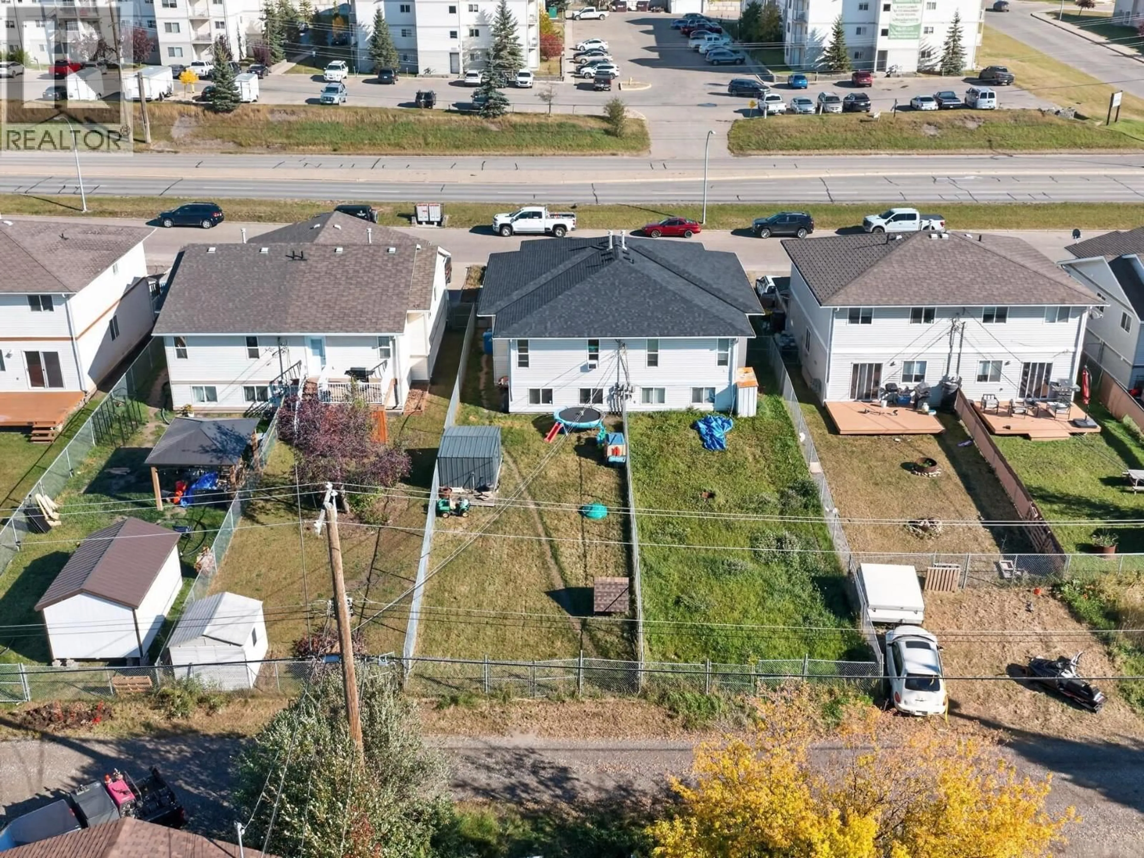 A pic from outside/outdoor area/front of a property/back of a property/a pic from drone, unknown for 8516 86 STREET, Fort St. John British Columbia V1J6Y7