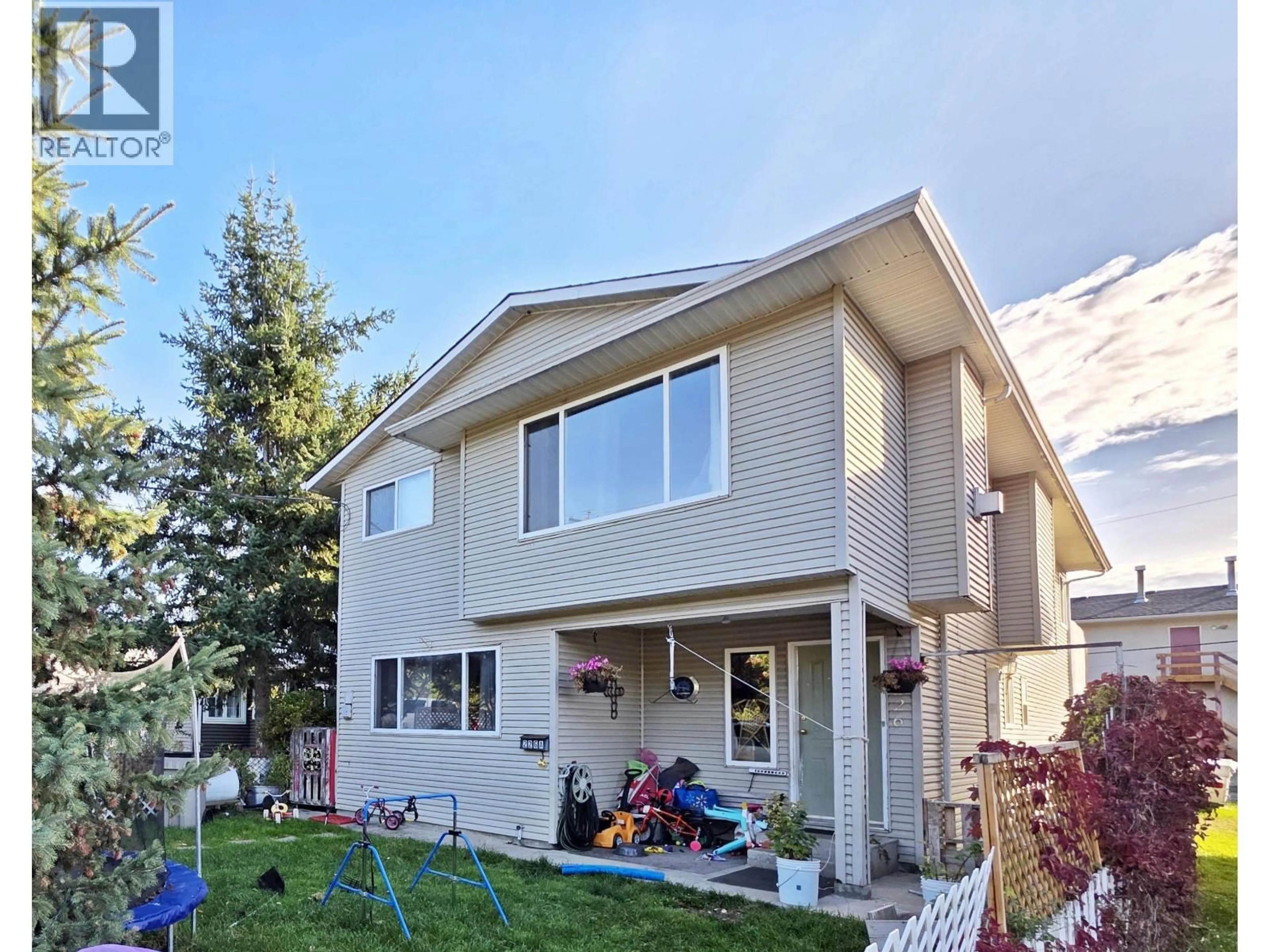 Home with vinyl exterior material, street for 226 BAKER DRIVE, Quesnel British Columbia V2J1T6