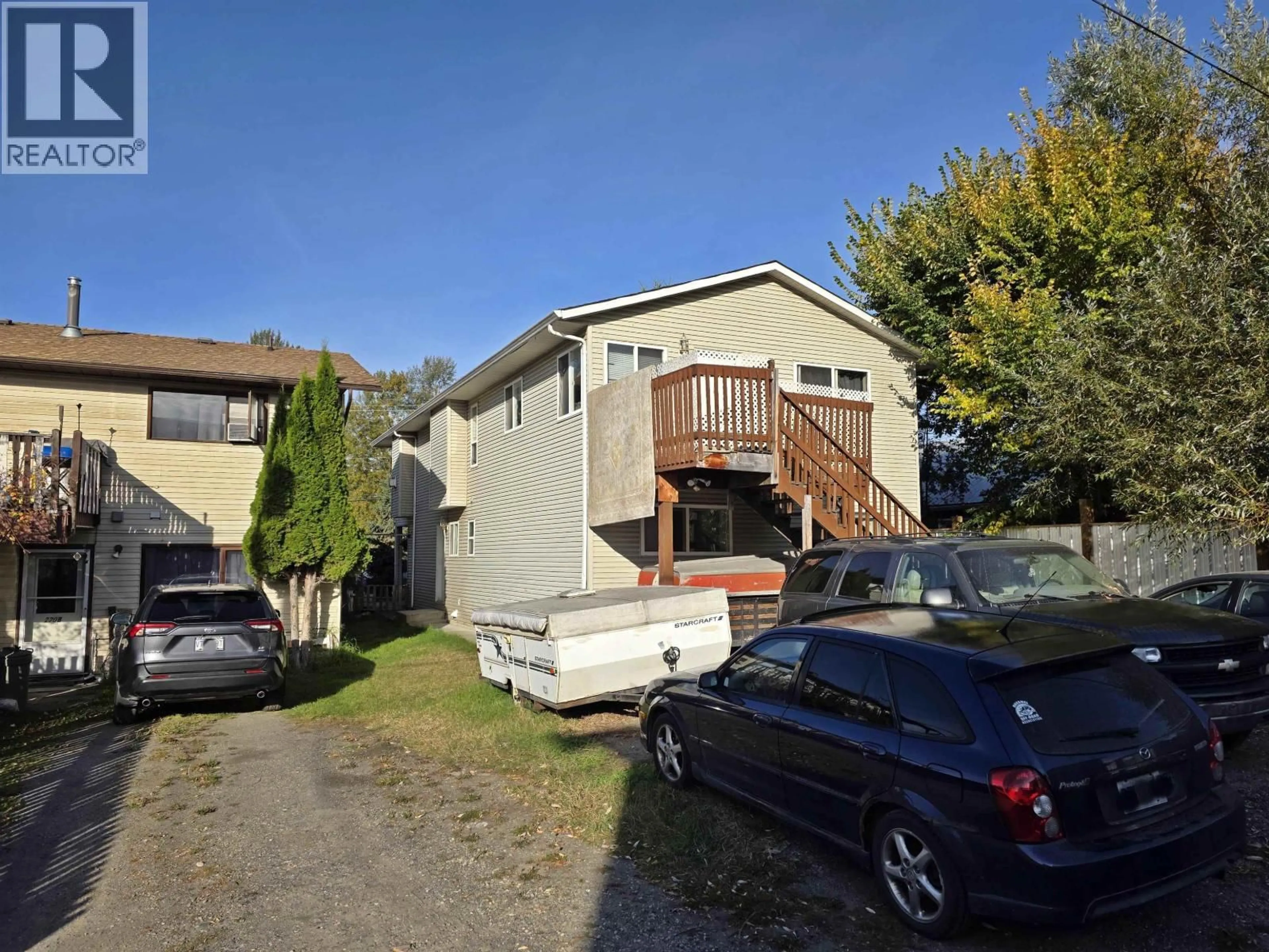 A pic from outside/outdoor area/front of a property/back of a property/a pic from drone, street for 226 BAKER DRIVE, Quesnel British Columbia V2J1T6