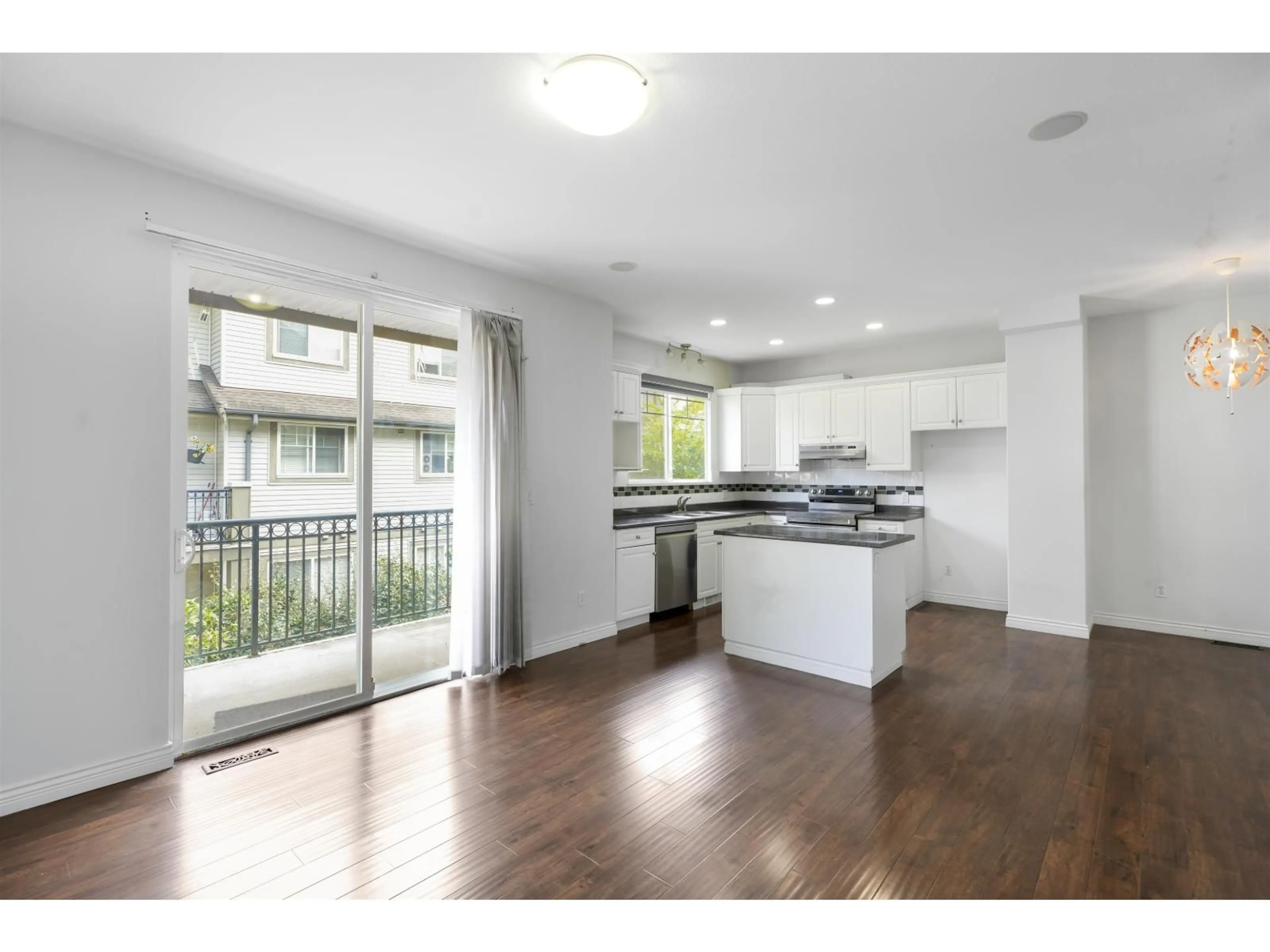 Open concept kitchen, wood/laminate floor for 36 - 14453 72 AVENUE, Surrey British Columbia V3S2E6