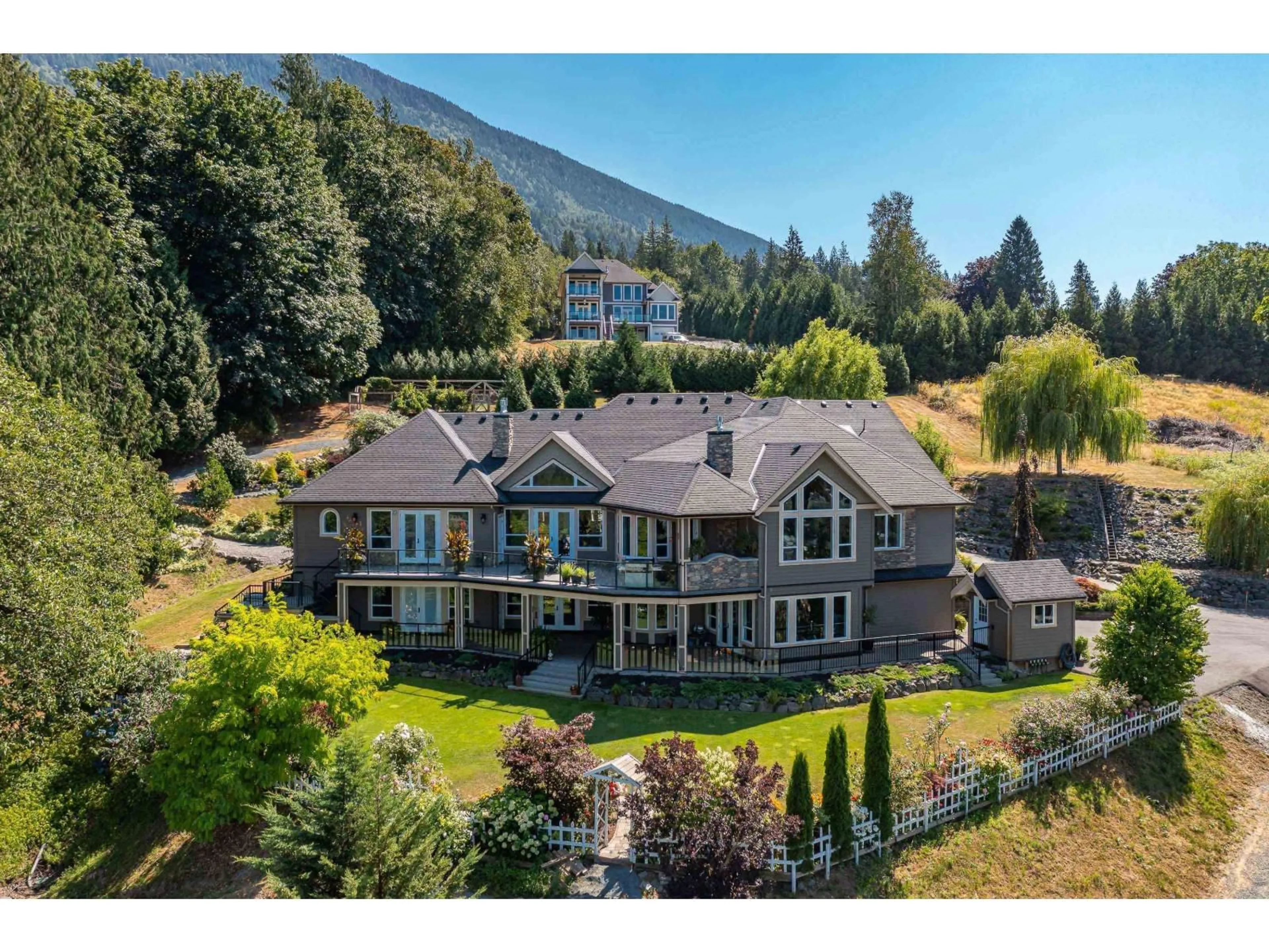 A pic from outside/outdoor area/front of a property/back of a property/a pic from drone, mountain view for 42395 HIGHLAND DRIVE, Yarrow British Columbia V2R5H2