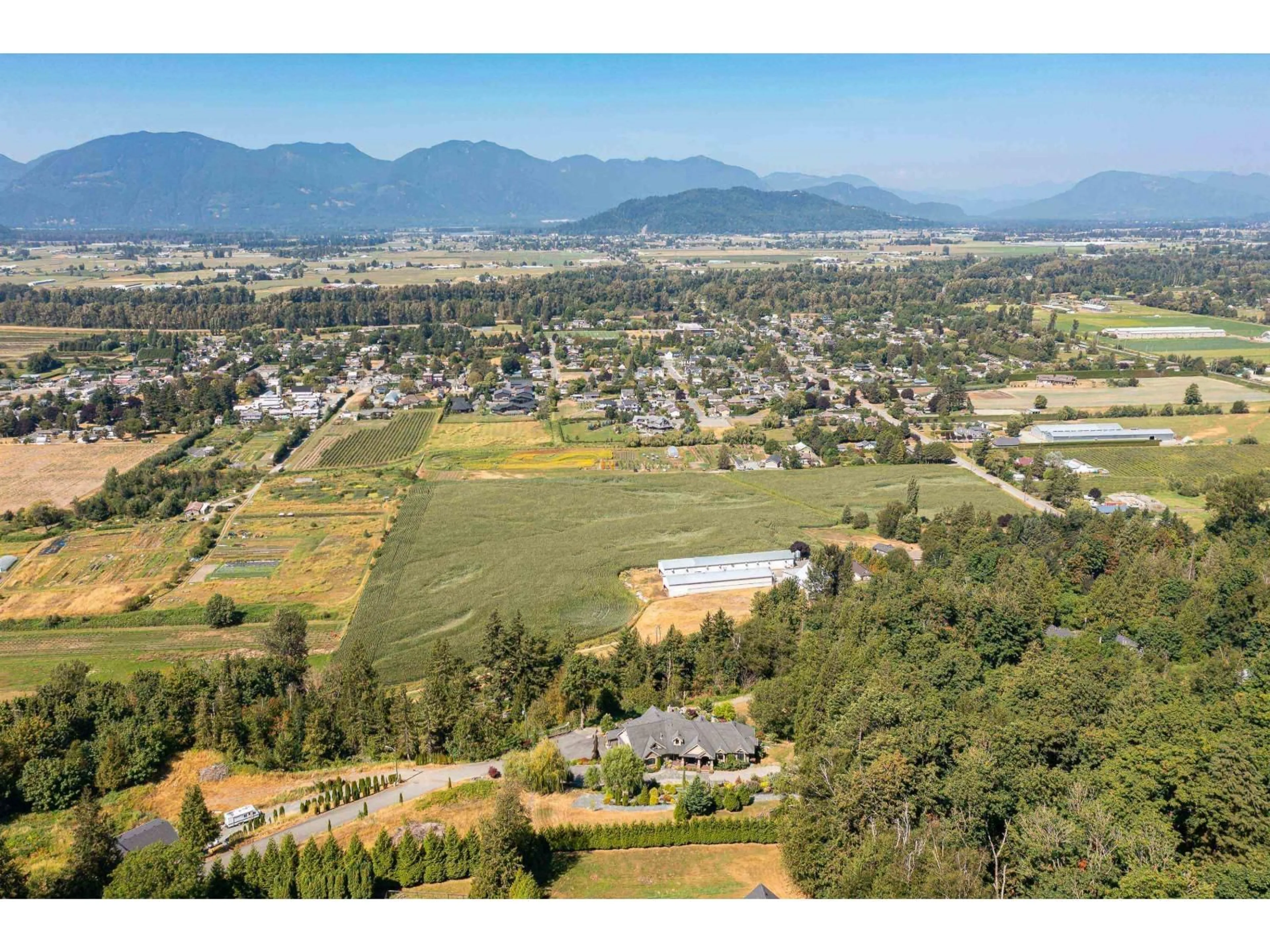 A pic from outside/outdoor area/front of a property/back of a property/a pic from drone, mountain view for 42395 HIGHLAND DRIVE, Yarrow British Columbia V2R5H2