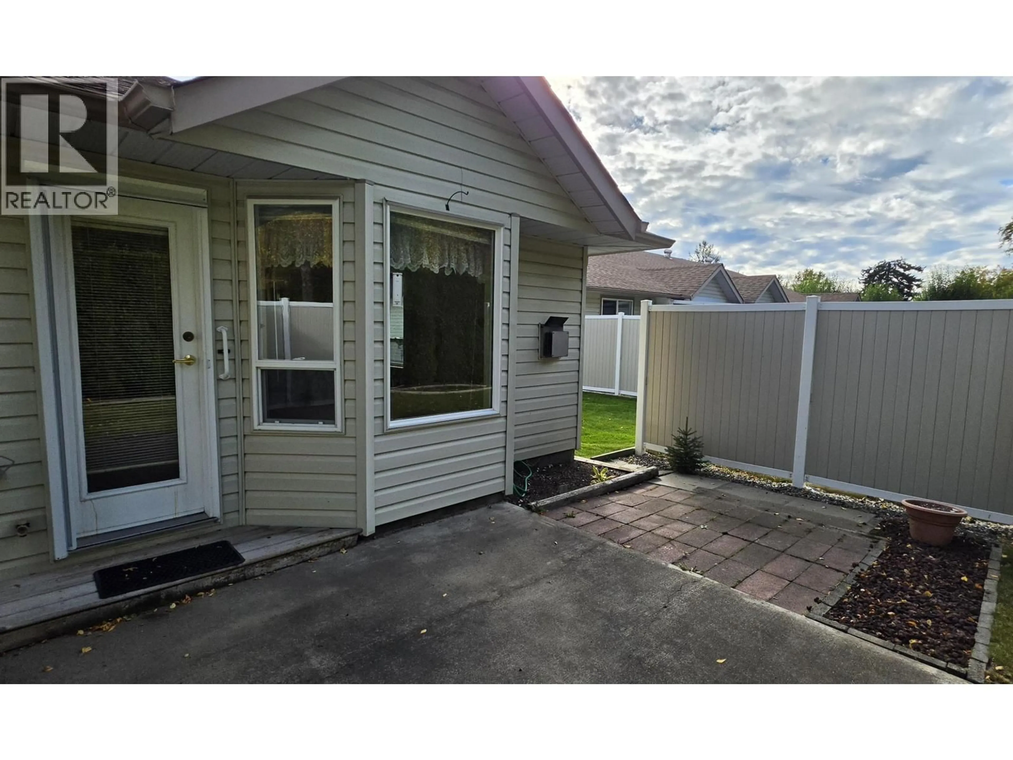 Home with vinyl exterior material, street for 8 - 490 LEWIS DRIVE, Quesnel British Columbia V2J5W2