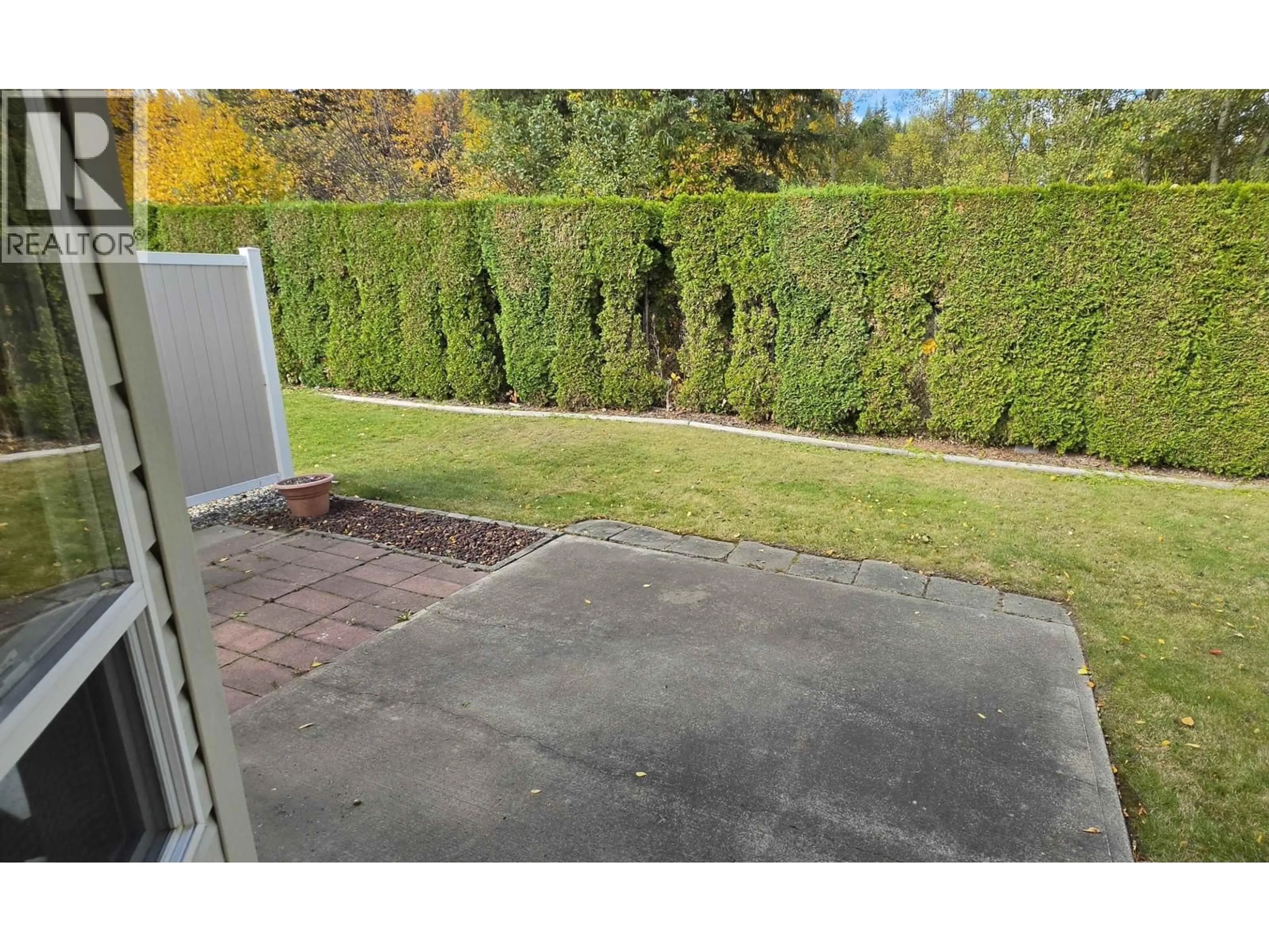 A pic from outside/outdoor area/front of a property/back of a property/a pic from drone, unknown for 8 - 490 LEWIS DRIVE, Quesnel British Columbia V2J5W2