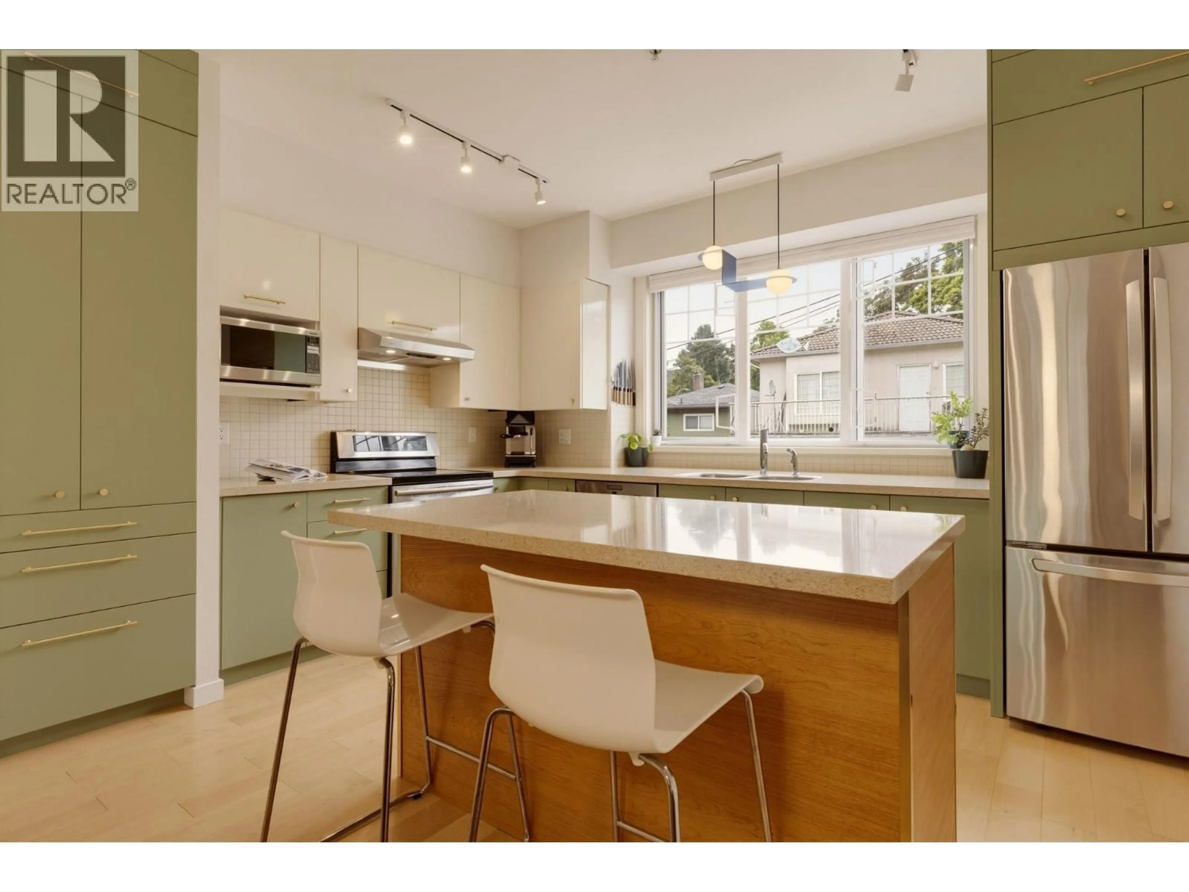 Contemporary kitchen, unknown for 3882 WELWYN STREET, Vancouver British Columbia V5N3Y9