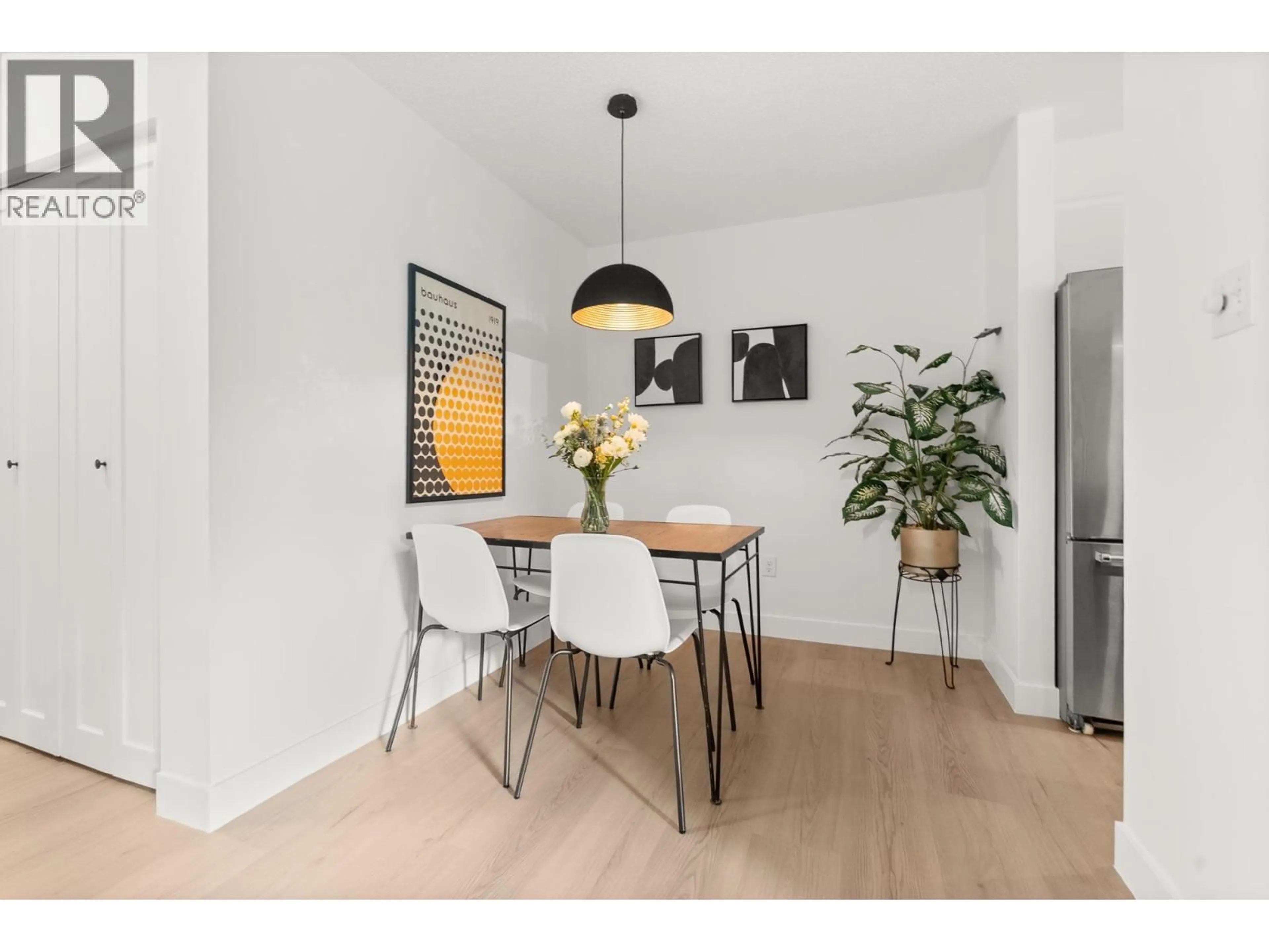 Dining room, wood/laminate floor for 204 - 391 7TH AVENUE, Vancouver British Columbia V5T4H1