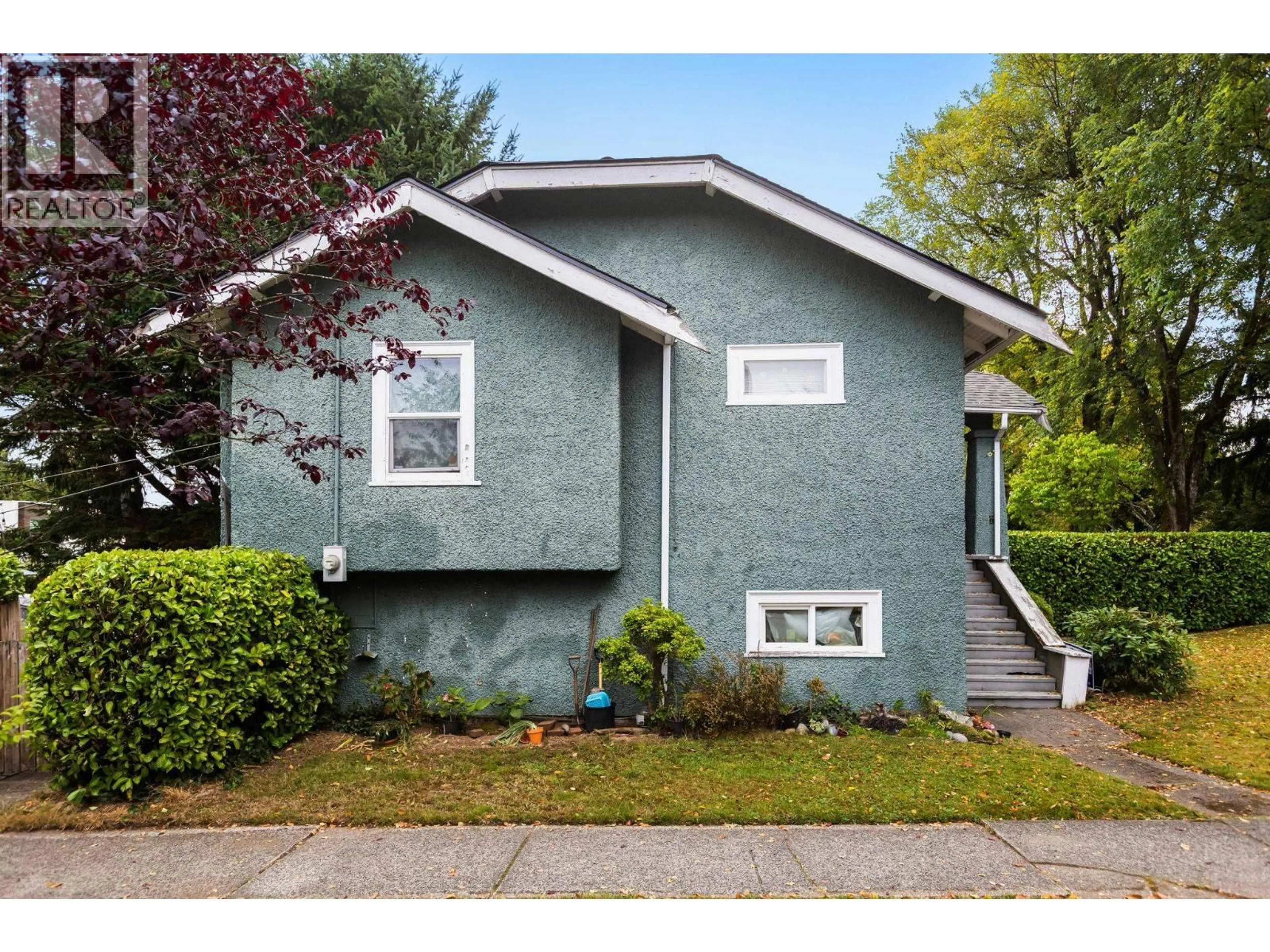 Home with vinyl exterior material, street for 3895 20TH AVENUE, Vancouver British Columbia V6S1G1