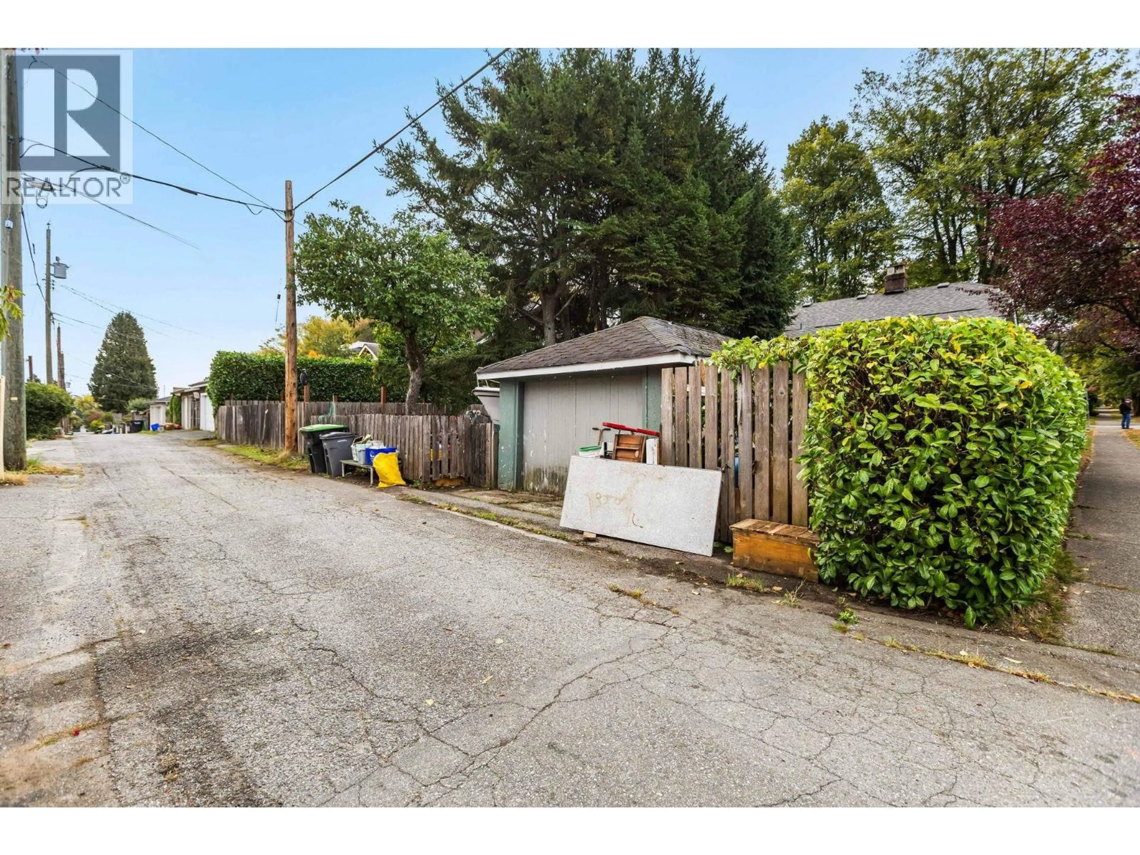 A pic from outside/outdoor area/front of a property/back of a property/a pic from drone, street for 3895 20TH AVENUE, Vancouver British Columbia V6S1G1