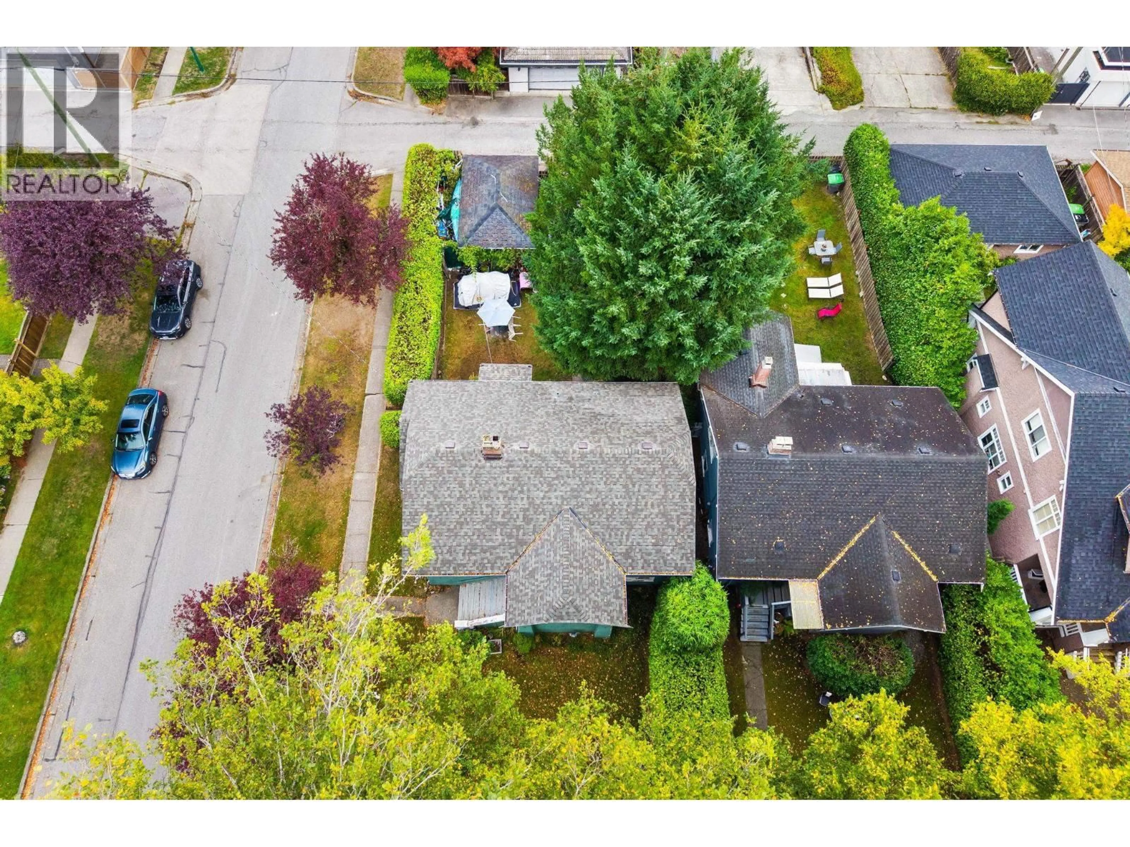 A pic from outside/outdoor area/front of a property/back of a property/a pic from drone, street for 3895 20TH AVENUE, Vancouver British Columbia V6S1G1