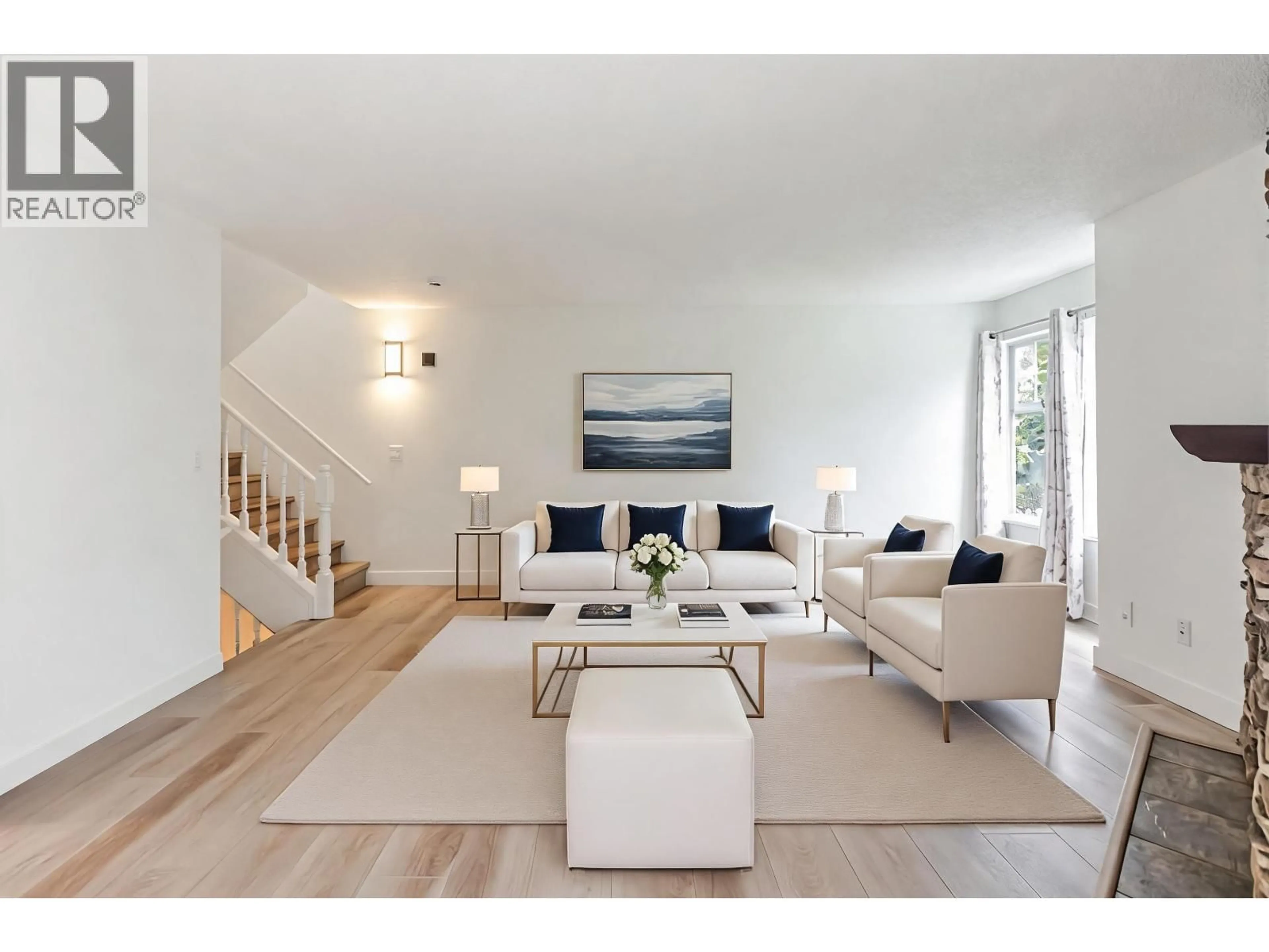 Living room with furniture, wood/laminate floor for 53 - 1140 FALCON DRIVE, Coquitlam British Columbia V3E2J9
