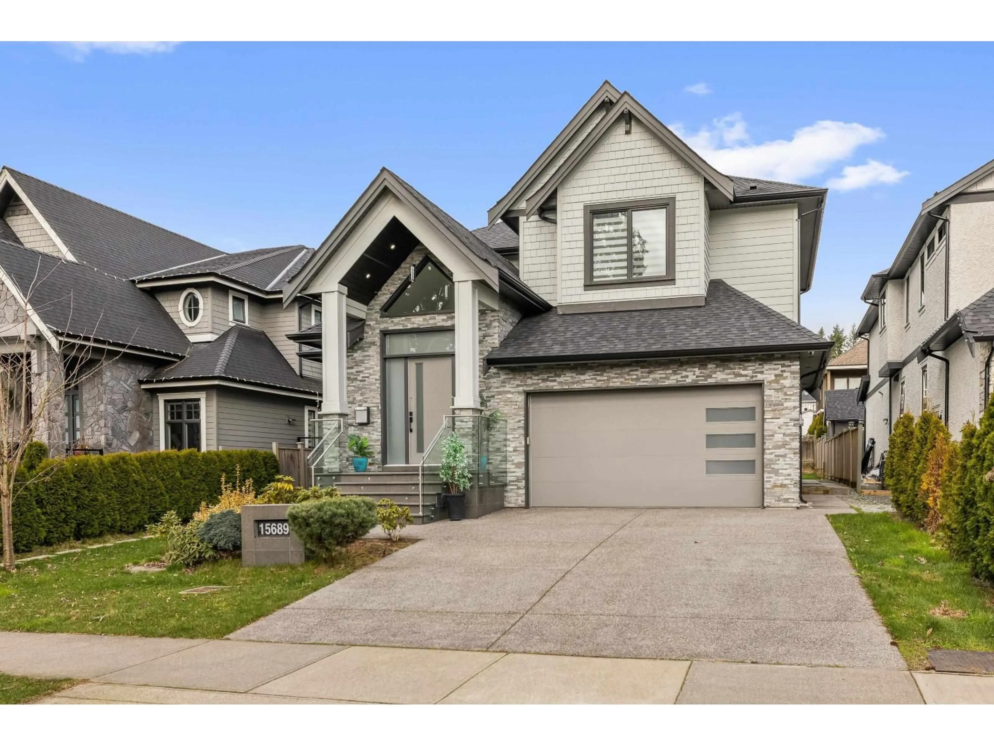 Home with brick exterior material, street for 15689 106A AVENUE, Surrey British Columbia V4N1K3