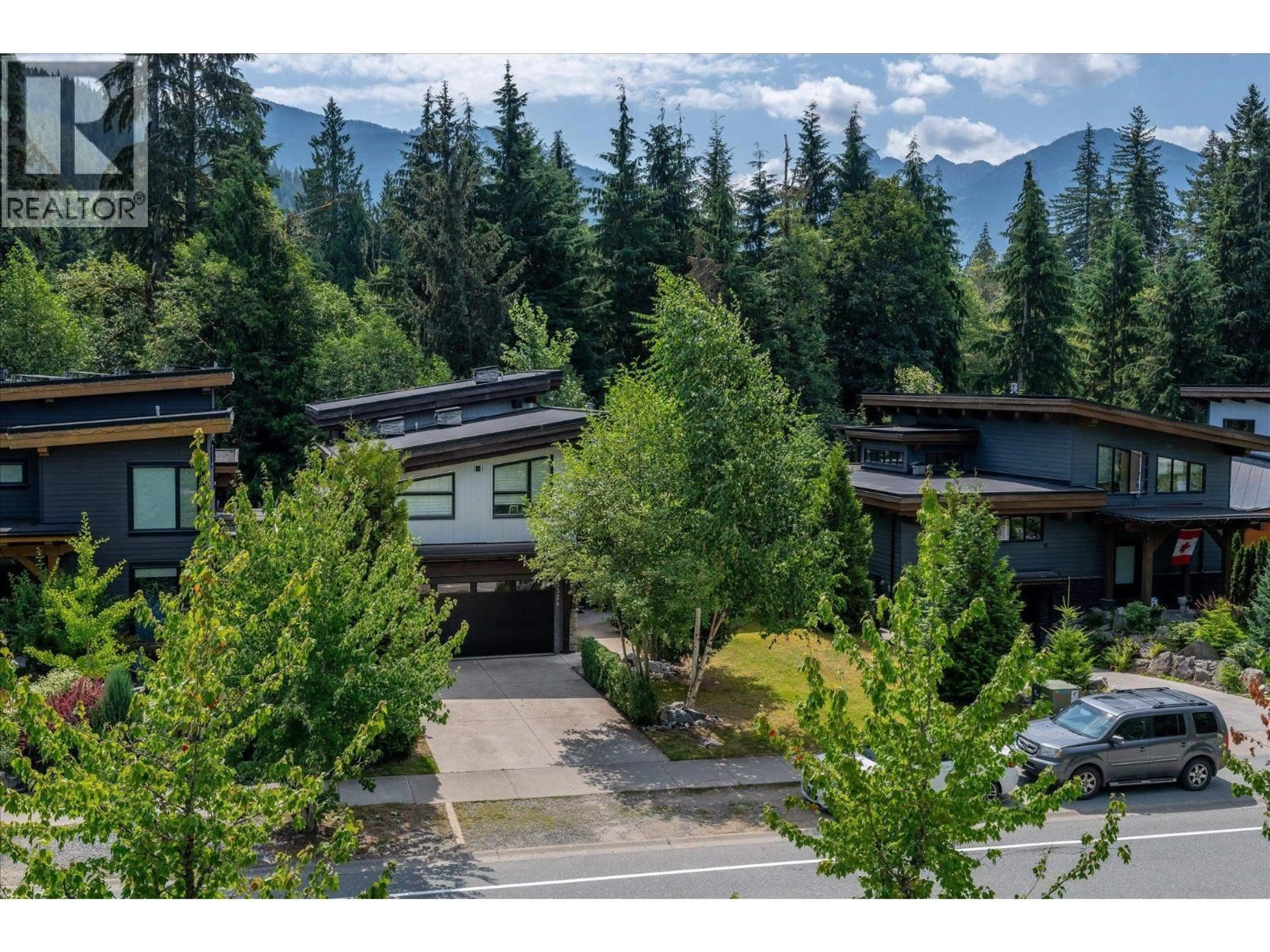 A pic from outside/outdoor area/front of a property/back of a property/a pic from drone, mountain view for 3324 MAMQUAM ROAD, Squamish British Columbia V8B0S6