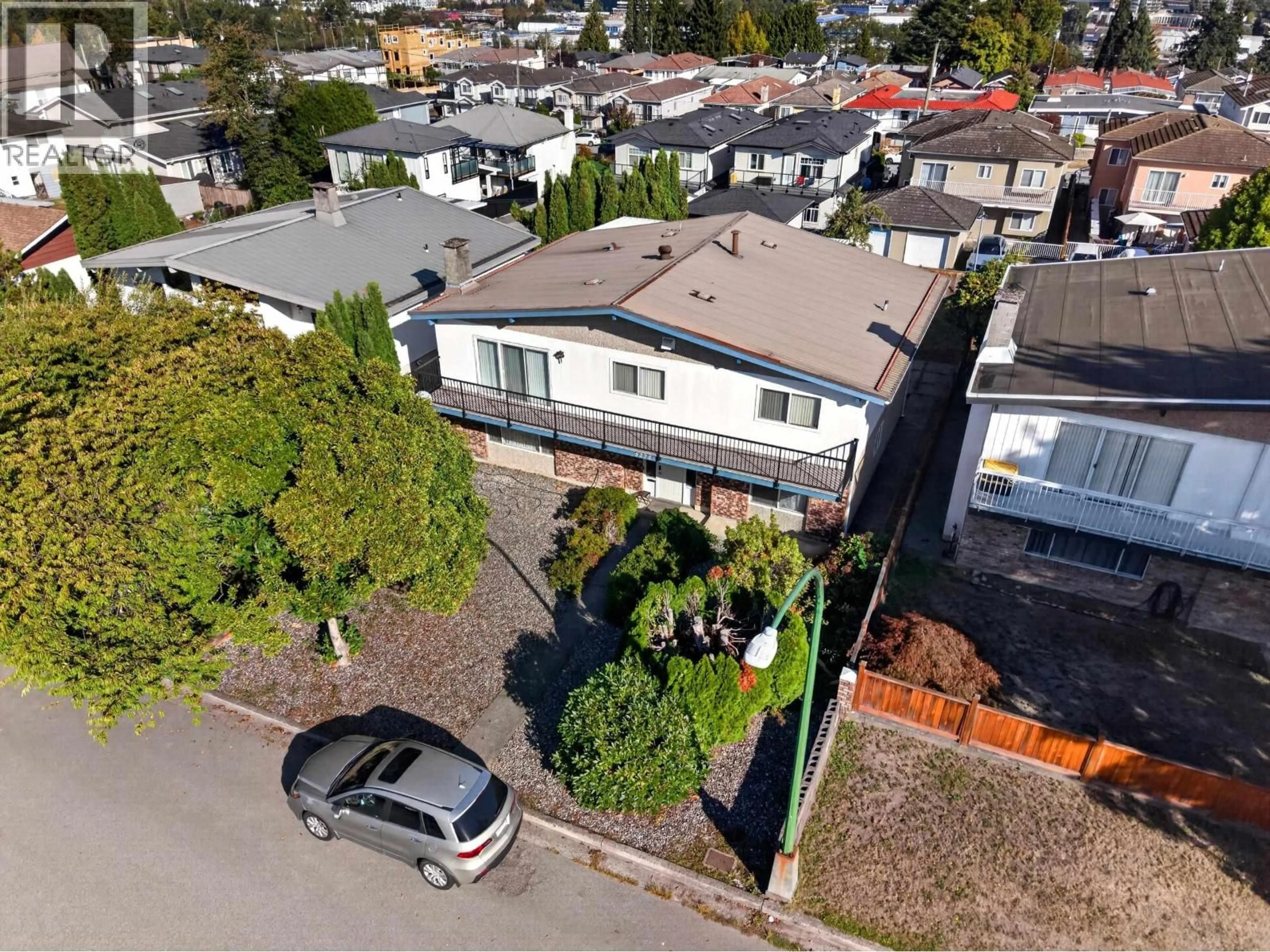 A pic from outside/outdoor area/front of a property/back of a property/a pic from drone, street for 5275 SCHOU STREET, Burnaby British Columbia V5G1M5