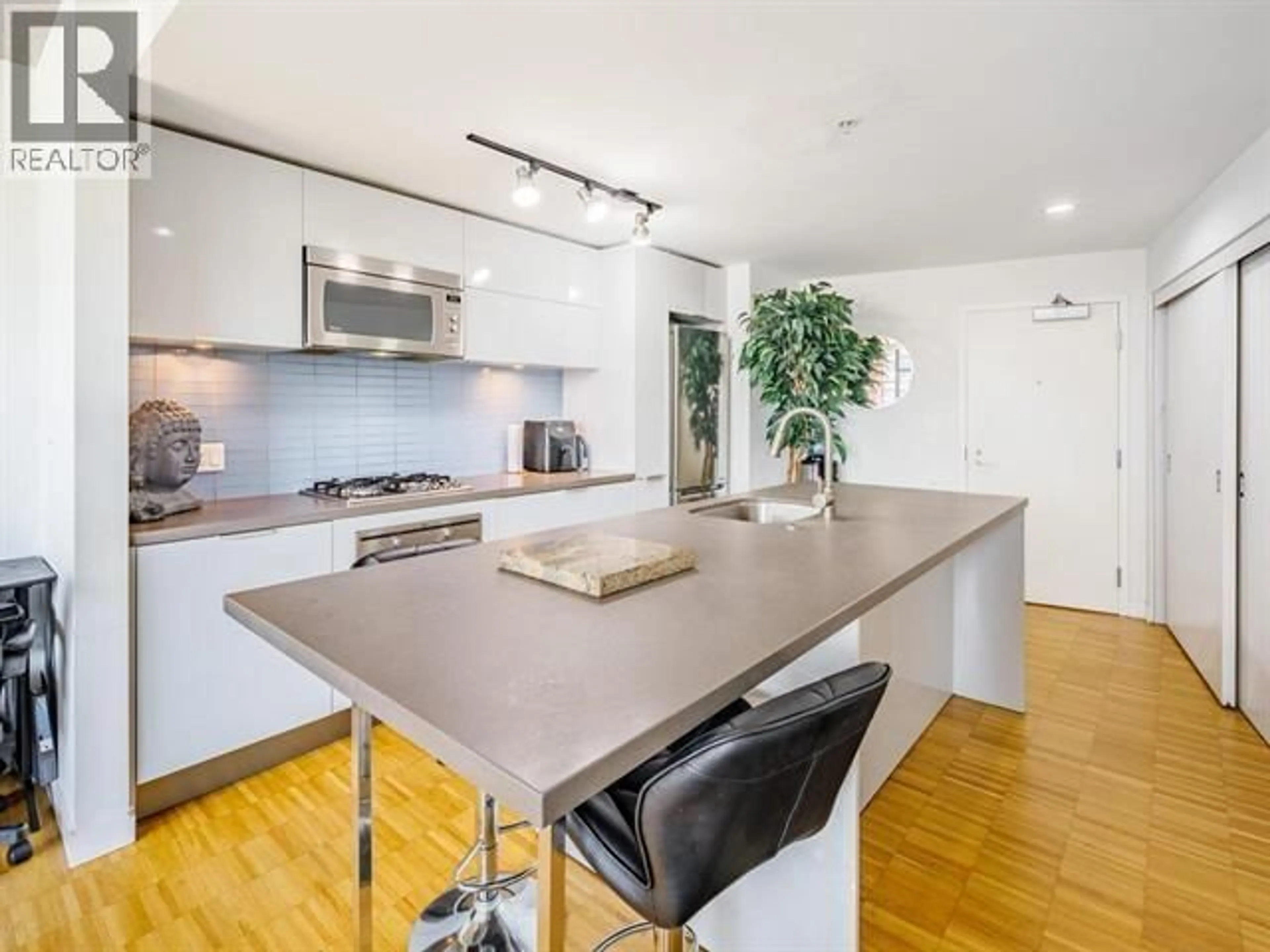 Open concept kitchen, wood/laminate floor for 1506 - 108 CORDOVA STREET, Vancouver British Columbia V6B0G5