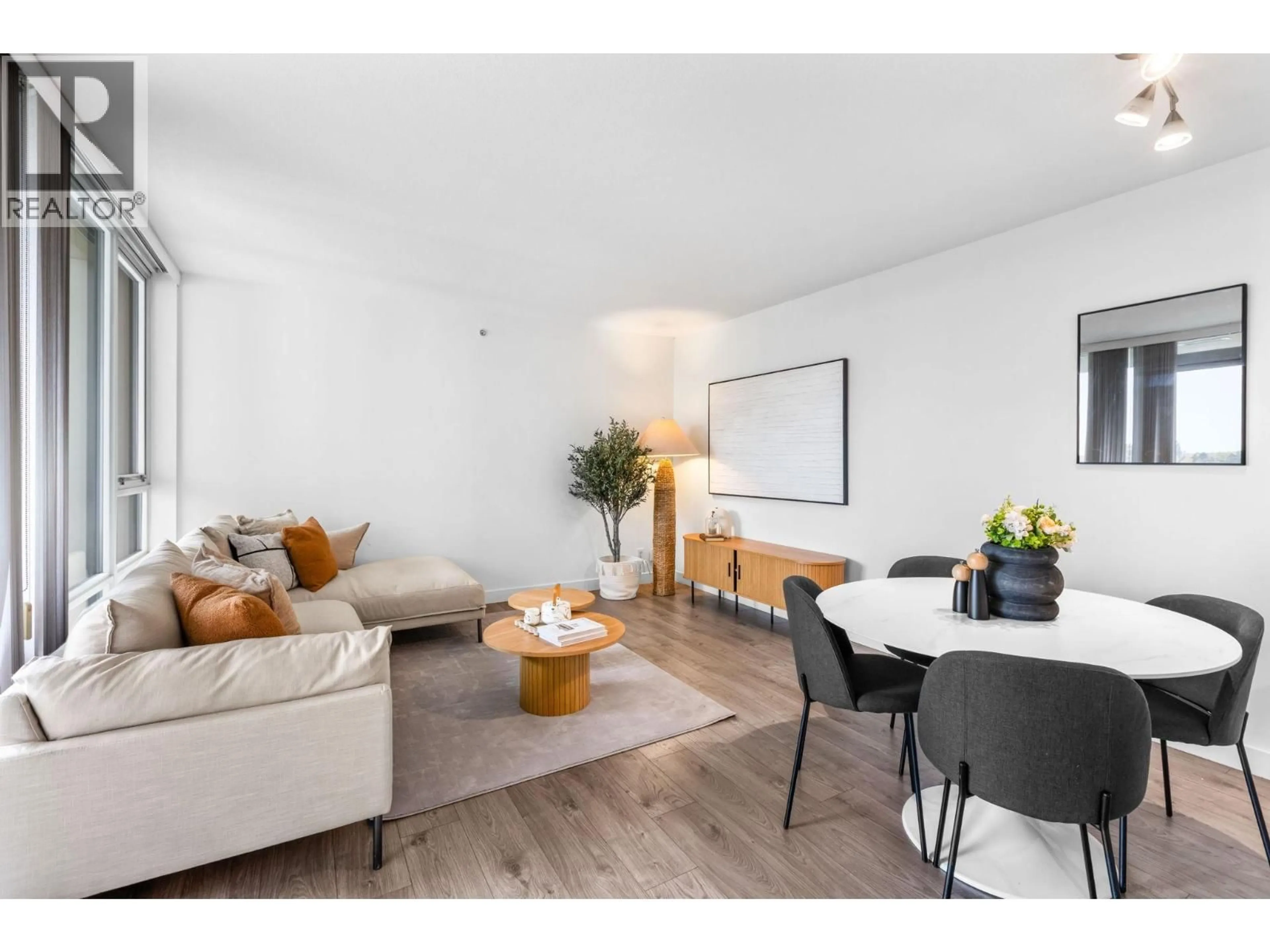 Living room with furniture, wood/laminate floor for 916 - 9171 FERNDALE ROAD, Richmond British Columbia V6Y0A5