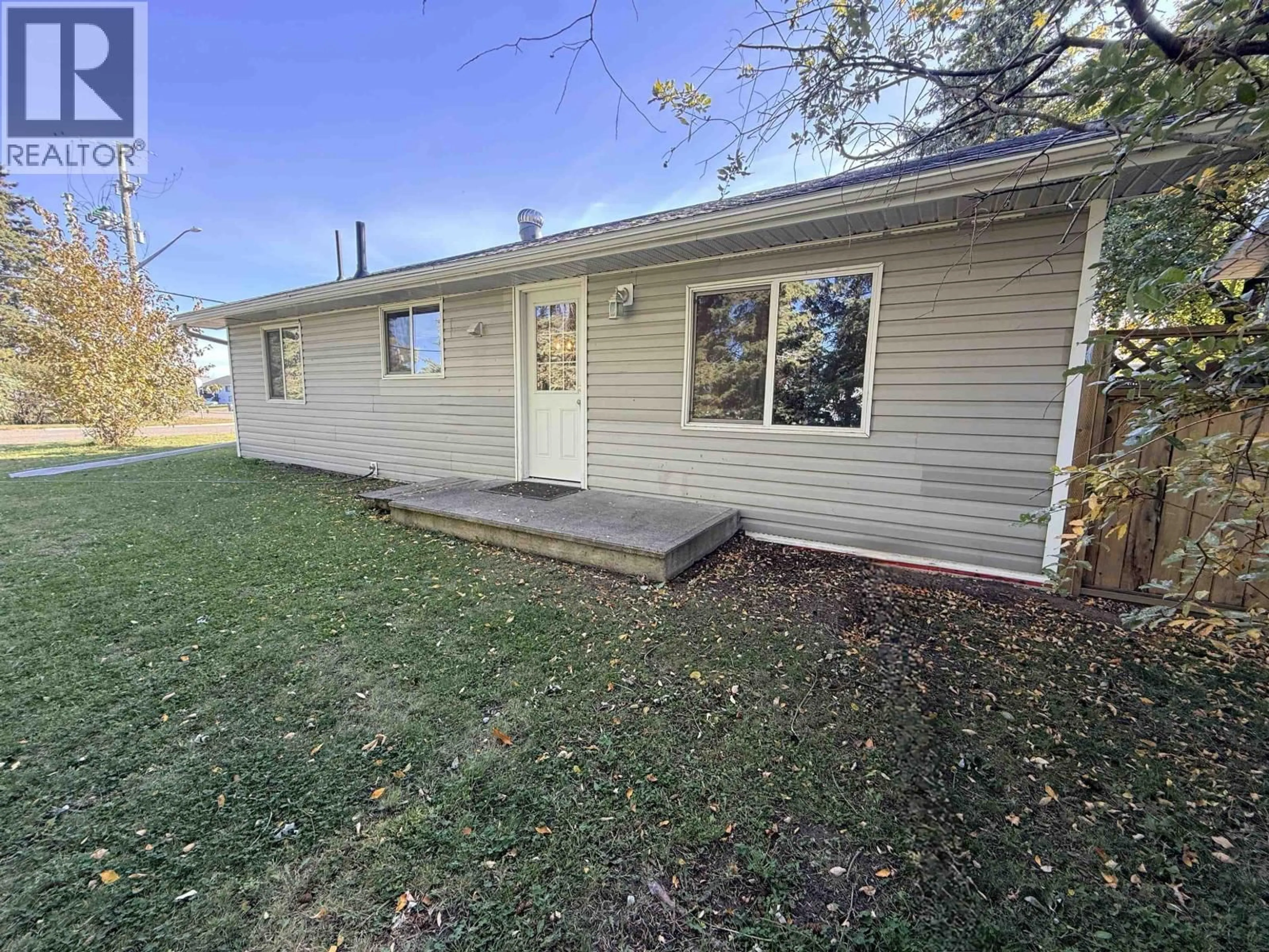 A pic from outside/outdoor area/front of a property/back of a property/a pic from drone, street for 9203 104 AVENUE, Fort St. John British Columbia V1J2J6