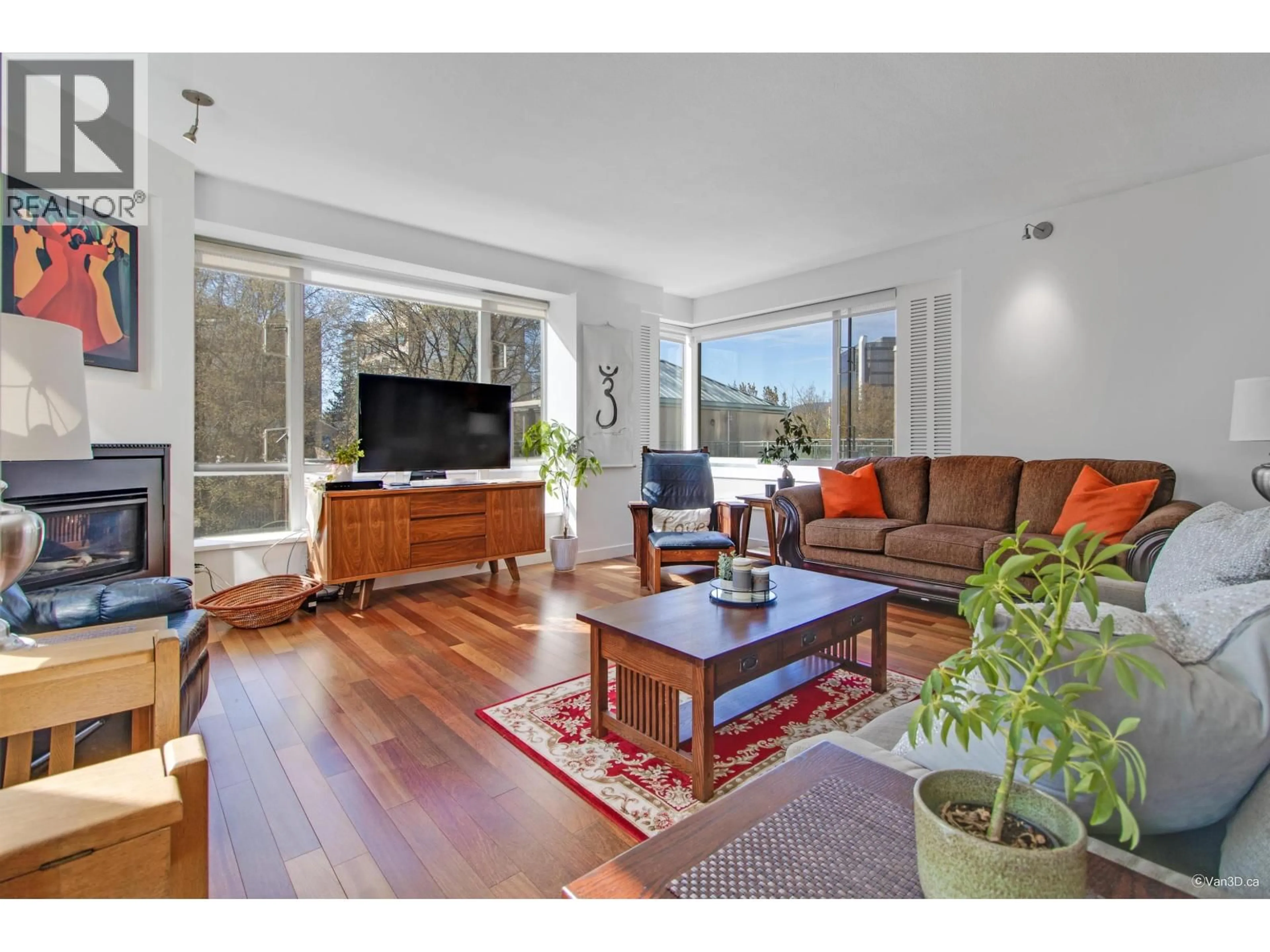 Living room with furniture, wood/laminate floor for 401 - 2628 ASH STREET, Vancouver British Columbia V5Z4L2