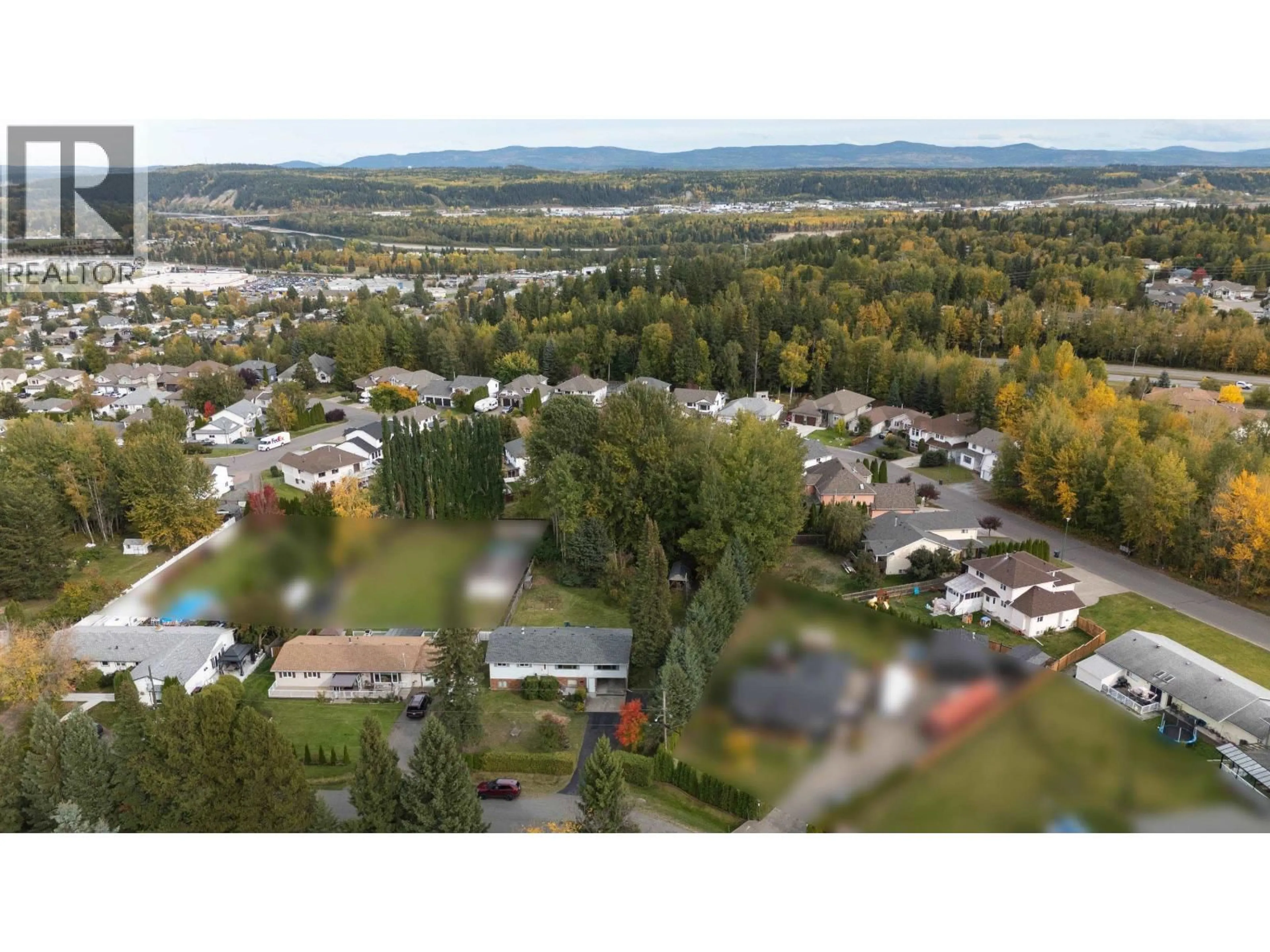 A pic from outside/outdoor area/front of a property/back of a property/a pic from drone, mountain view for 2948 CHARELLA DRIVE, Prince George British Columbia V2N5L1