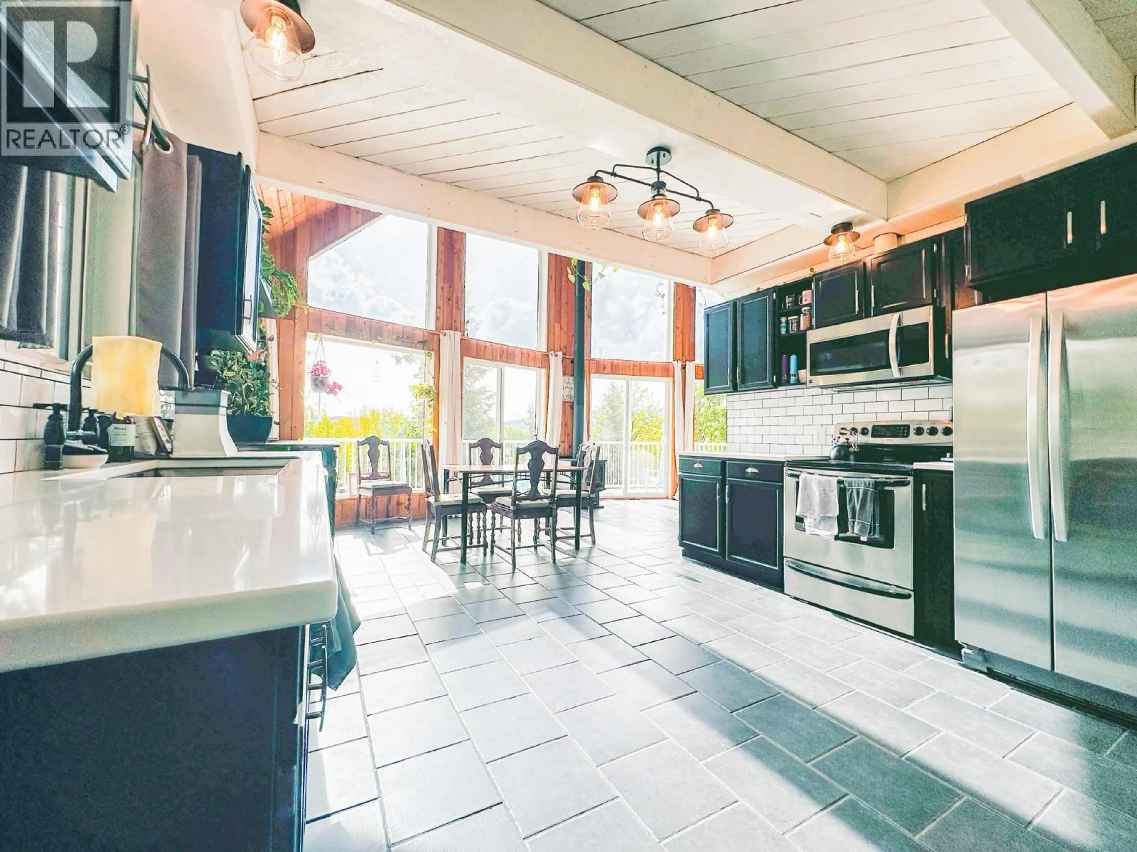 Open concept kitchen, ceramic/tile floor for 298 3RD AVENUE, Burns Lake British Columbia V0J1E0