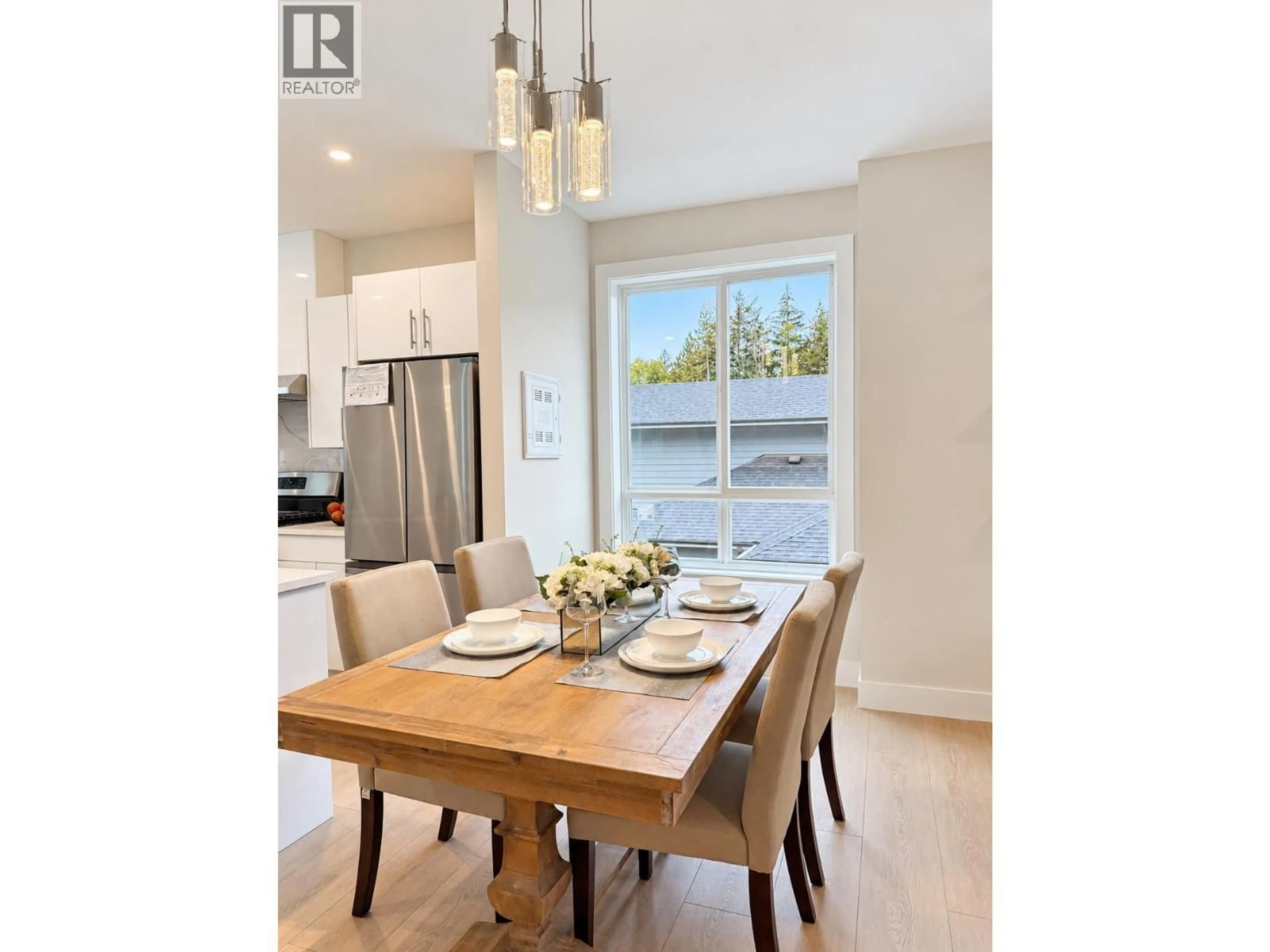 Open concept kitchen, wood/laminate floor for 4 - 6095 ROSEWOOD PLACE, Sechelt British Columbia V7Z0P9