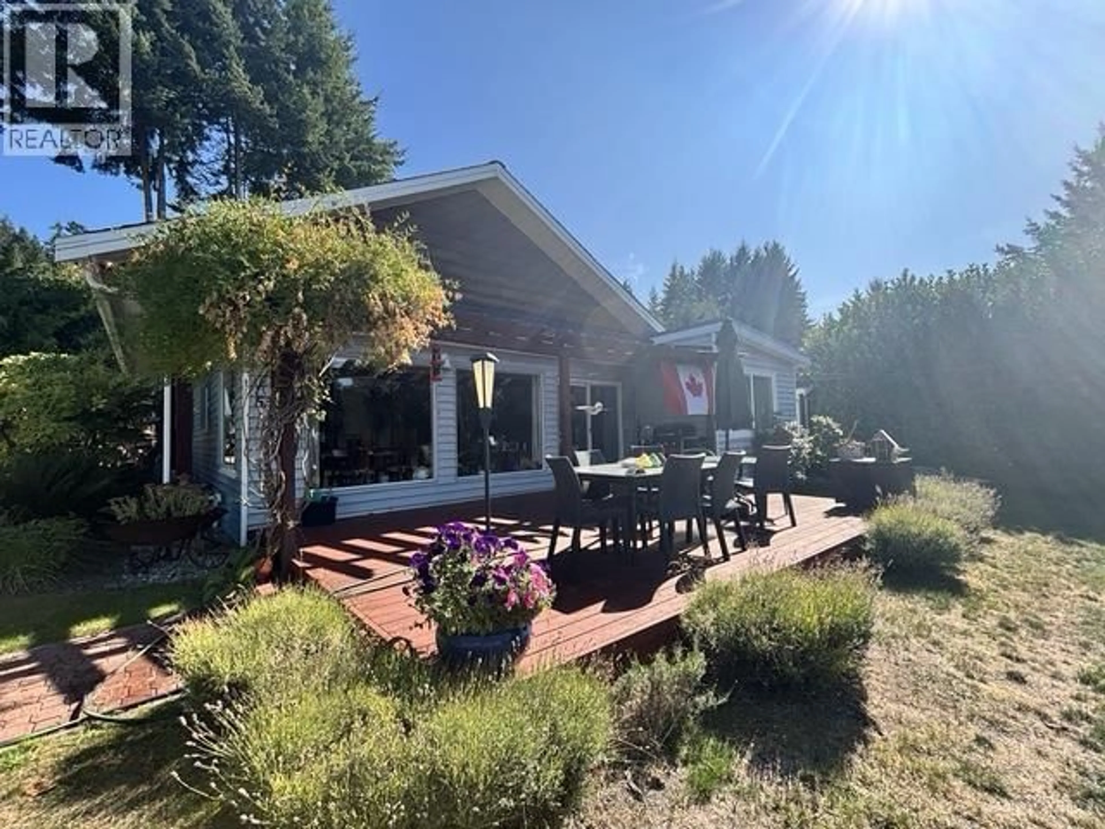 A pic from outside/outdoor area/front of a property/back of a property/a pic from drone, mountain view for 5206 RADCLIFFE ROAD, Sechelt British Columbia V7Z0C1