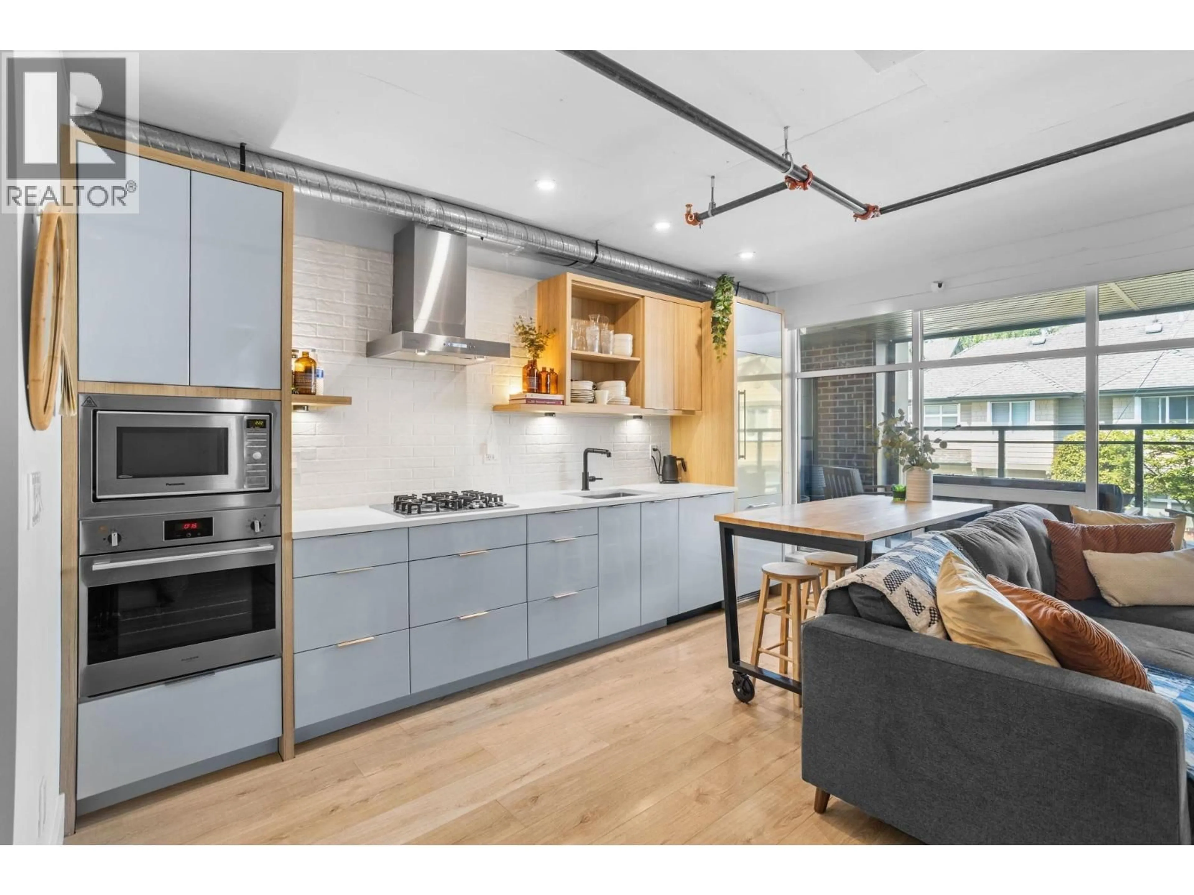 Open concept kitchen, unknown for 104 - 4223 HASTINGS STREET, Burnaby British Columbia V5C2J5