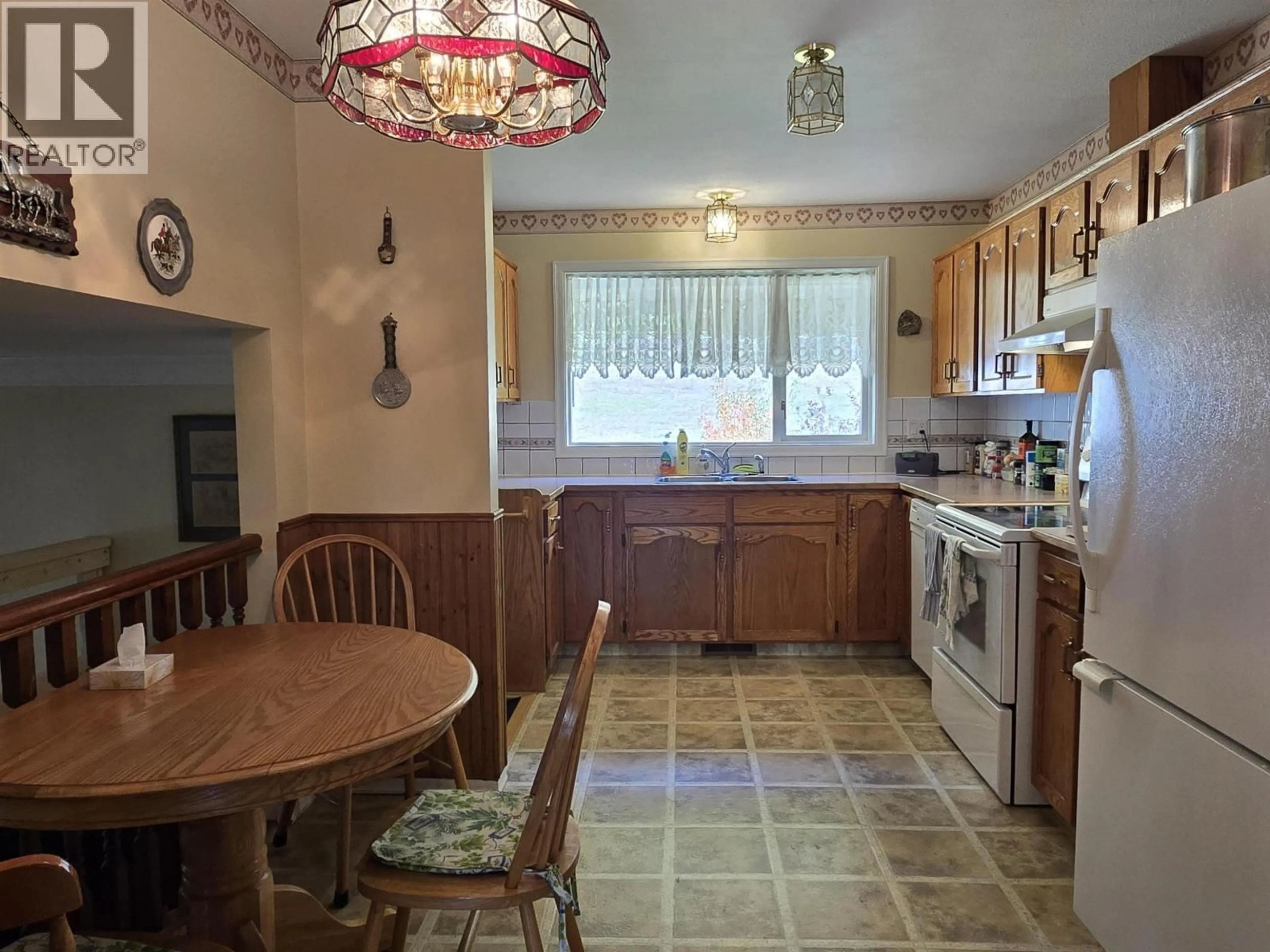 Standard kitchen, ceramic/tile floor for 4706 NORTH MEADOW ROAD, Prince George British Columbia V2K4K1