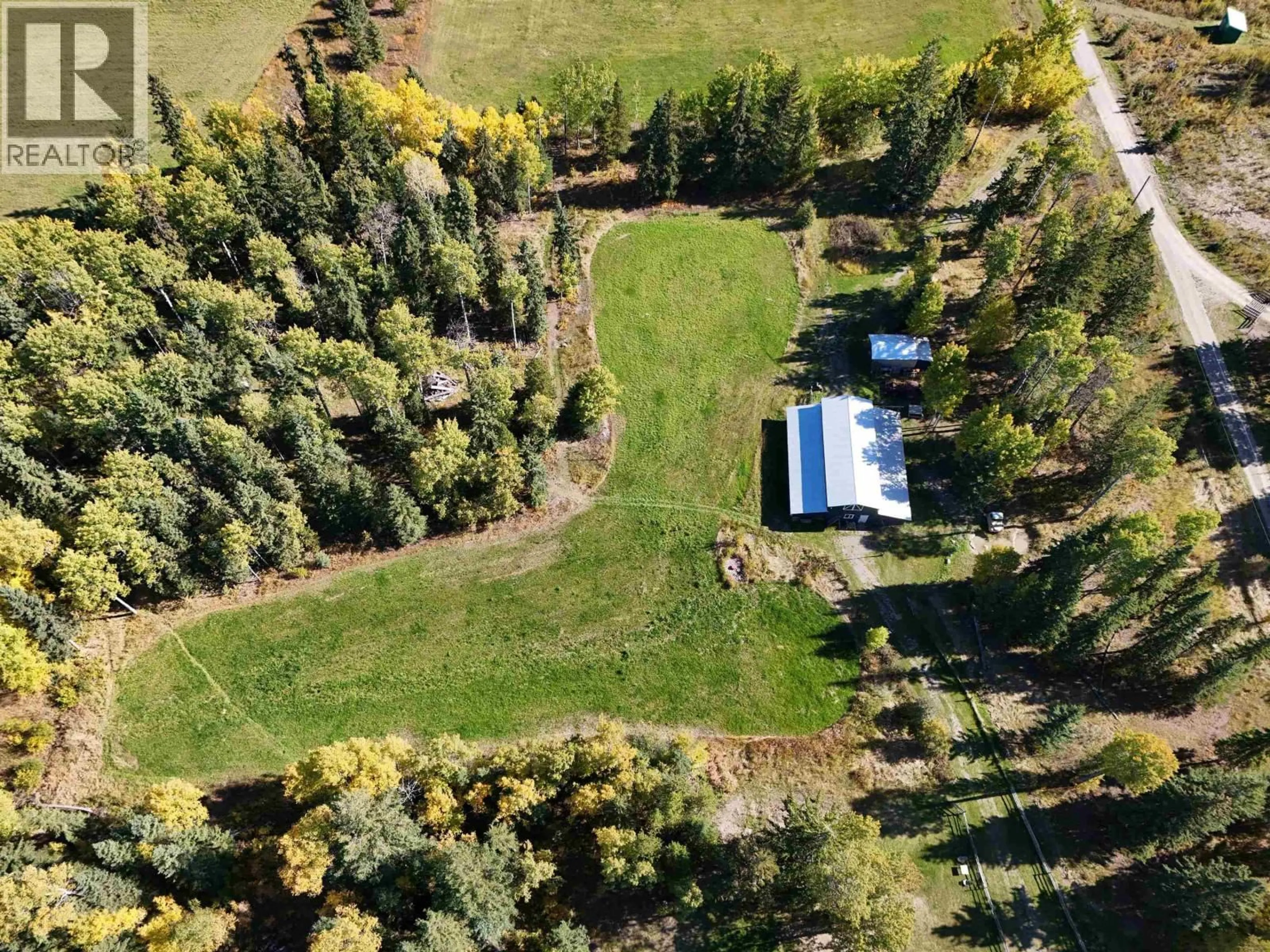 A pic from outside/outdoor area/front of a property/back of a property/a pic from drone, forest/trees view for 2226 GARNER ROAD, Quesnel British Columbia V2J6H6