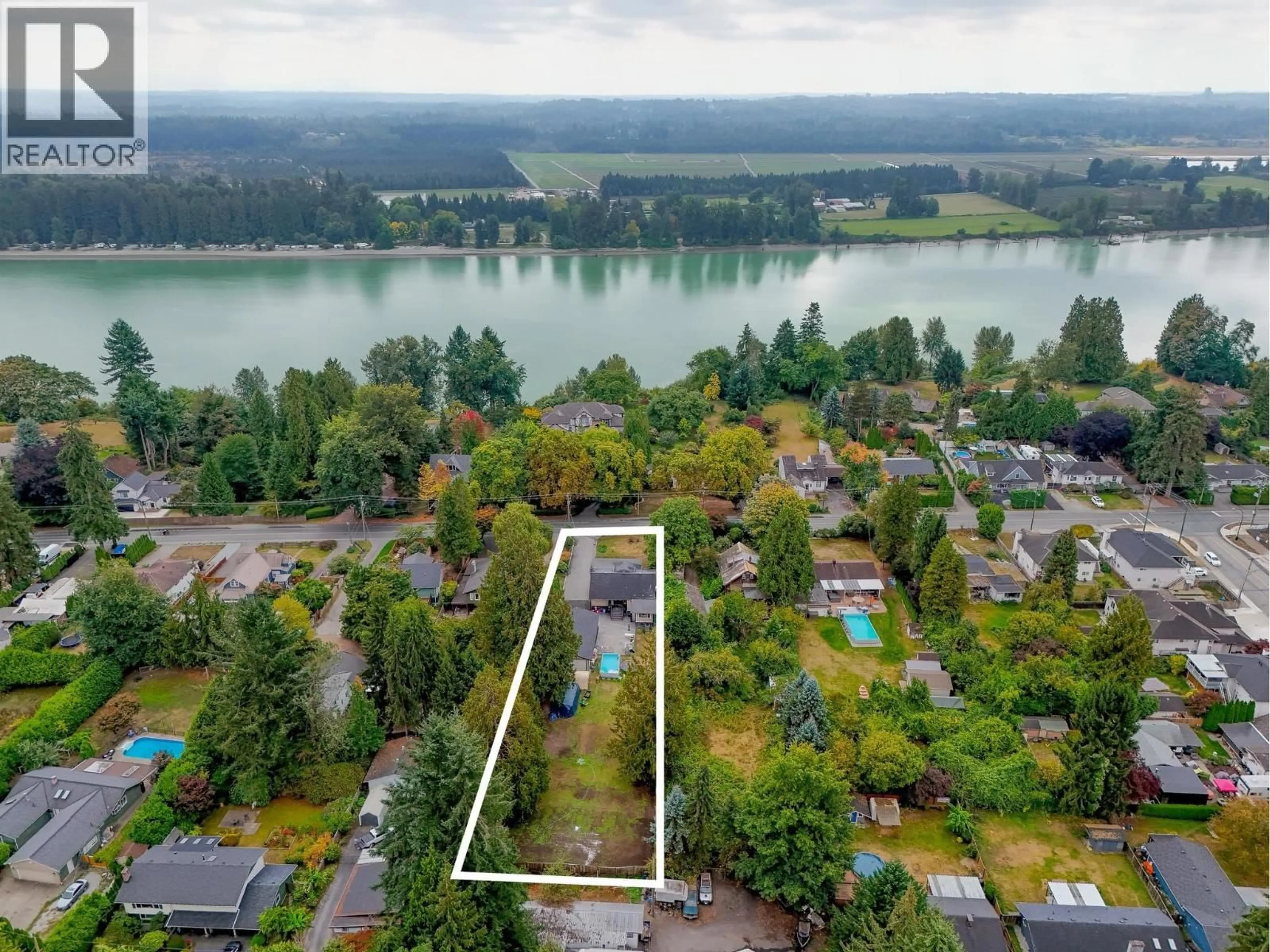 A pic from outside/outdoor area/front of a property/back of a property/a pic from drone, water/lake/river/ocean view for 21673 RIVER ROAD, Maple Ridge British Columbia V2X2B8