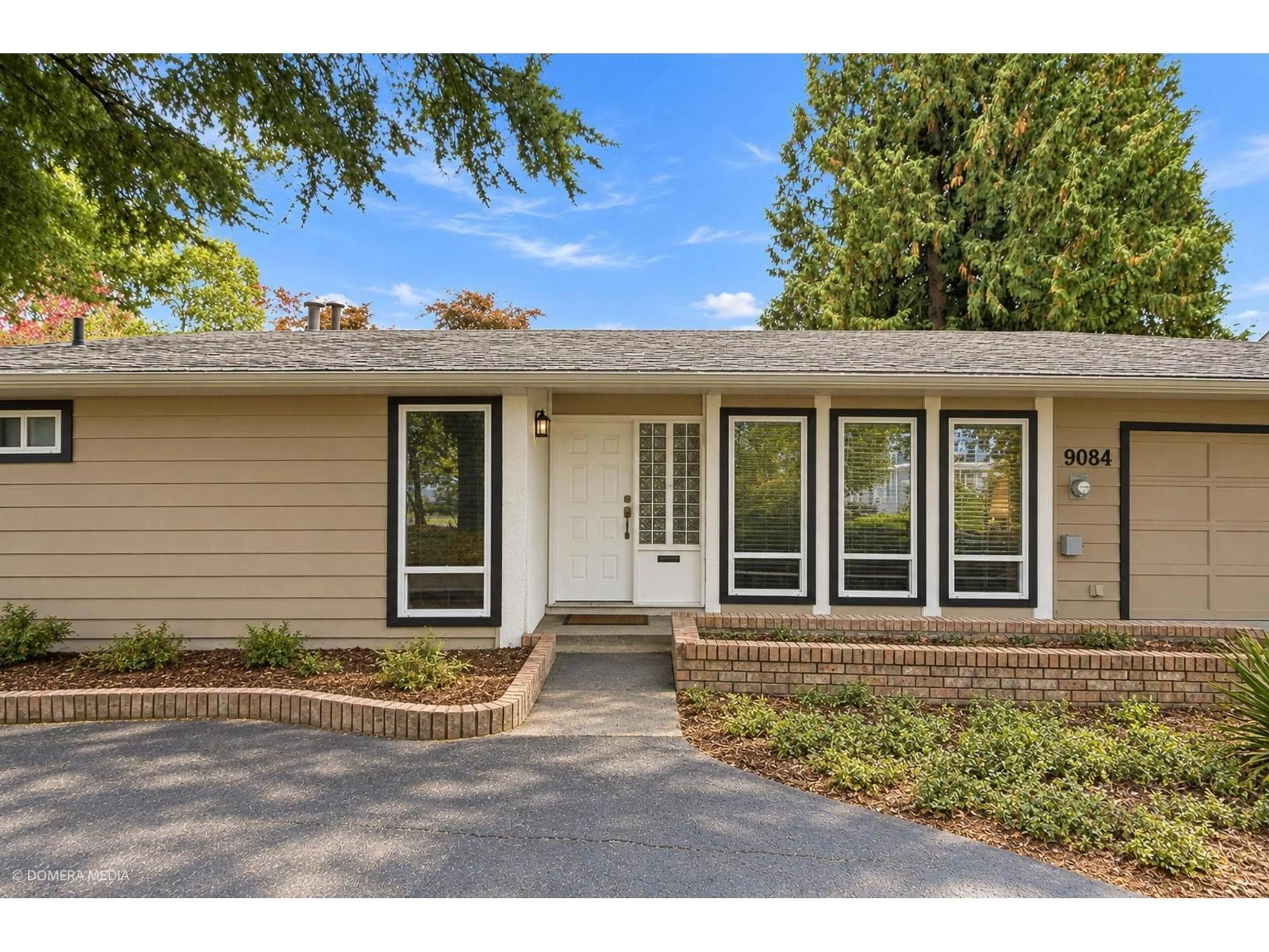 Home with vinyl exterior material, street for 9084 PRINCE CHARLES BOULEVARD, Surrey British Columbia V3V1R5