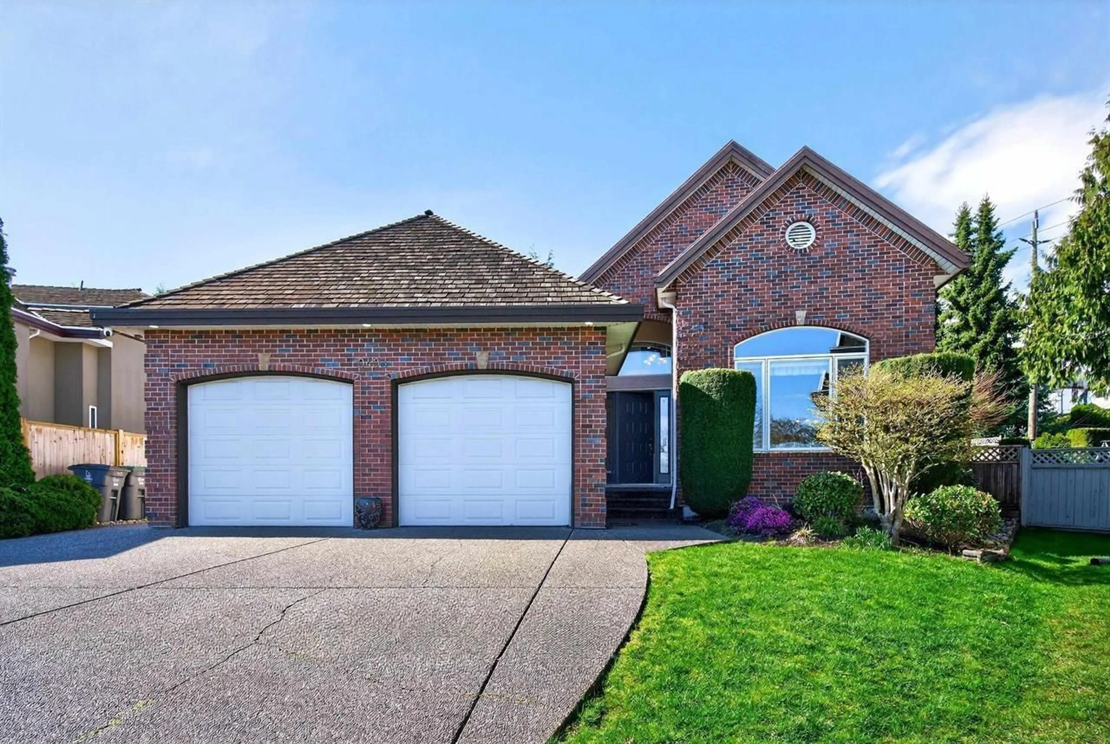 Home with brick exterior material, street for 9493 163 STREET, Surrey British Columbia V4N3C5