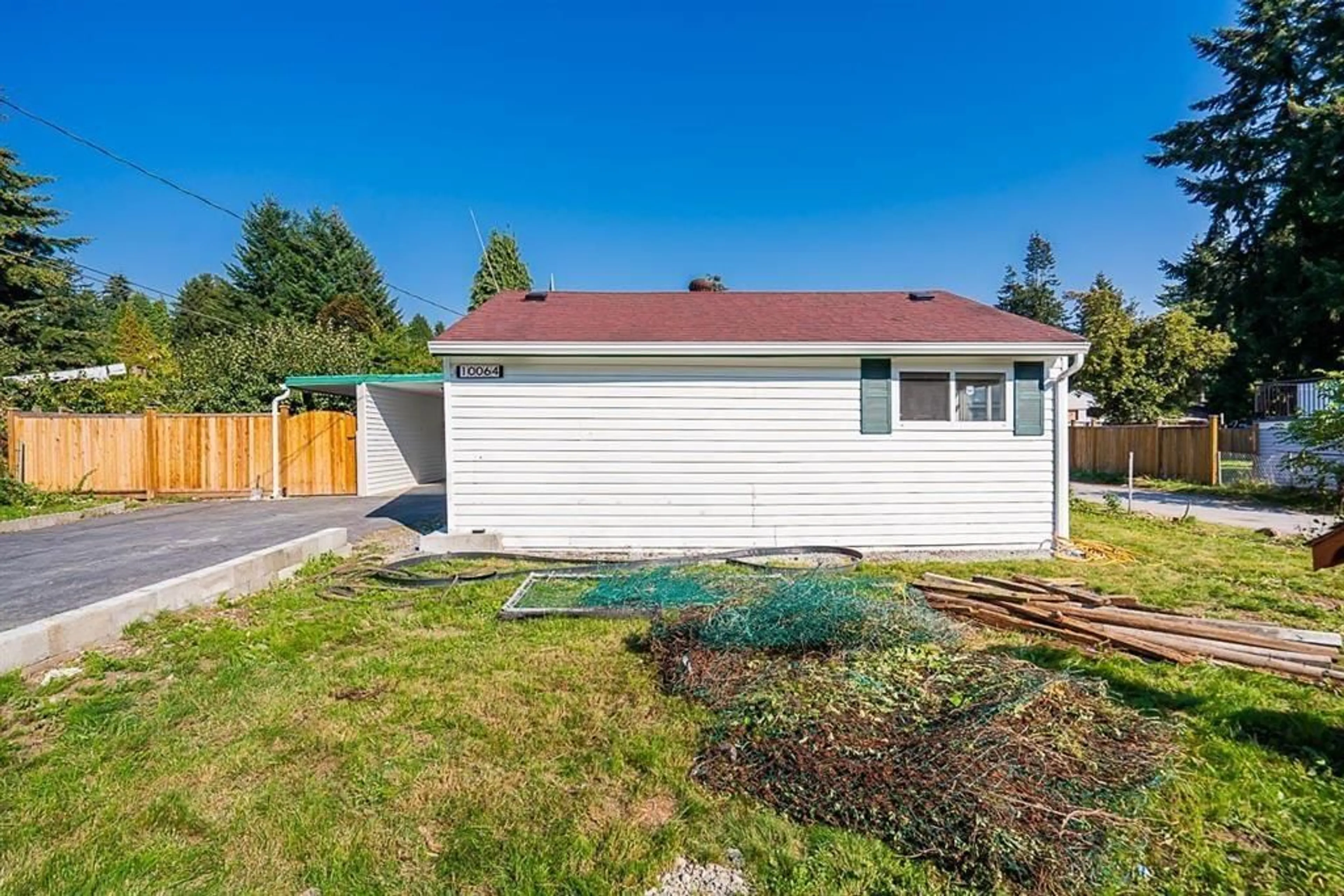 Home with vinyl exterior material, street for 10064 127B STREET, Surrey British Columbia V3V5M3