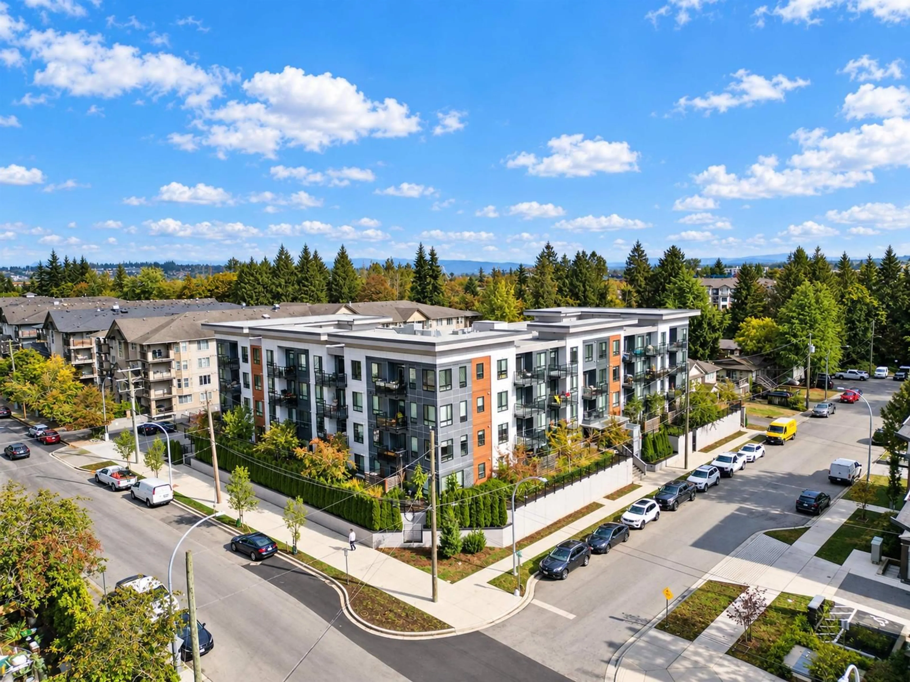 A pic from outside/outdoor area/front of a property/back of a property/a pic from drone, city buildings view from balcony for 409 - 19825 54 AVENUE, Langley British Columbia V3A0P6