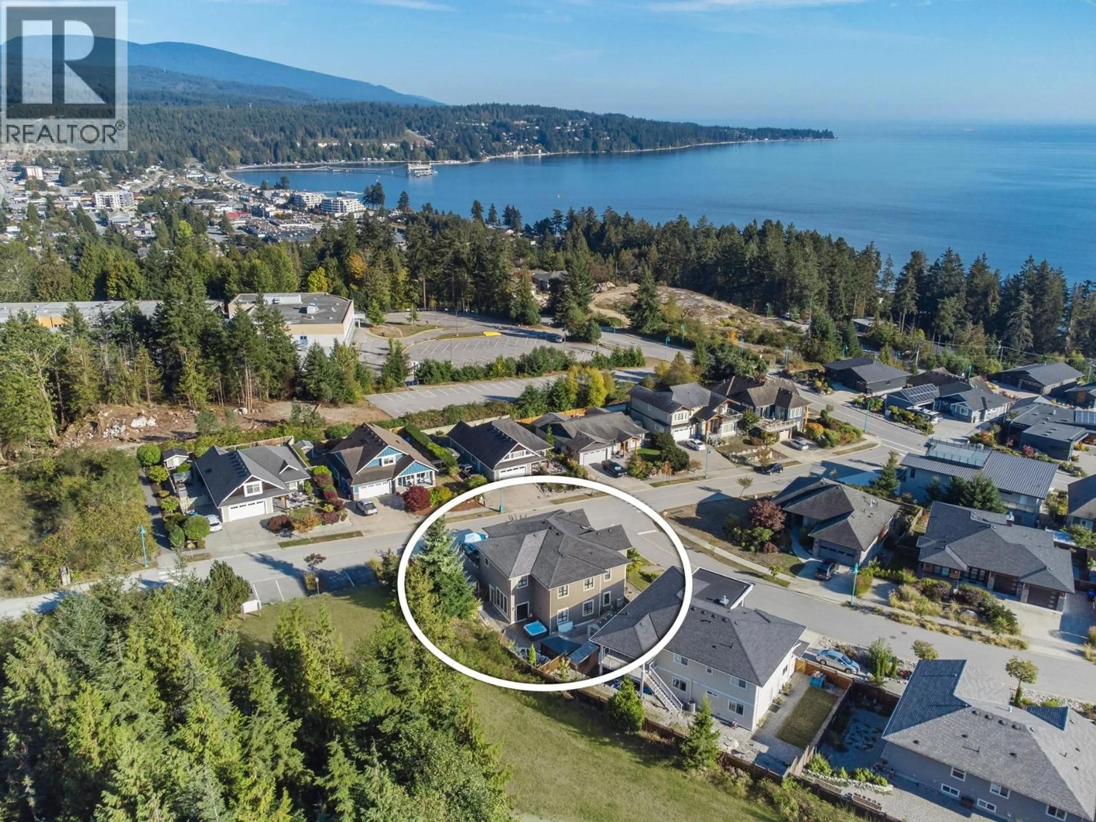 A pic from outside/outdoor area/front of a property/back of a property/a pic from drone, water/lake/river/ocean view for 5950 COMPASS LANE, Sechelt British Columbia V7Z0V1