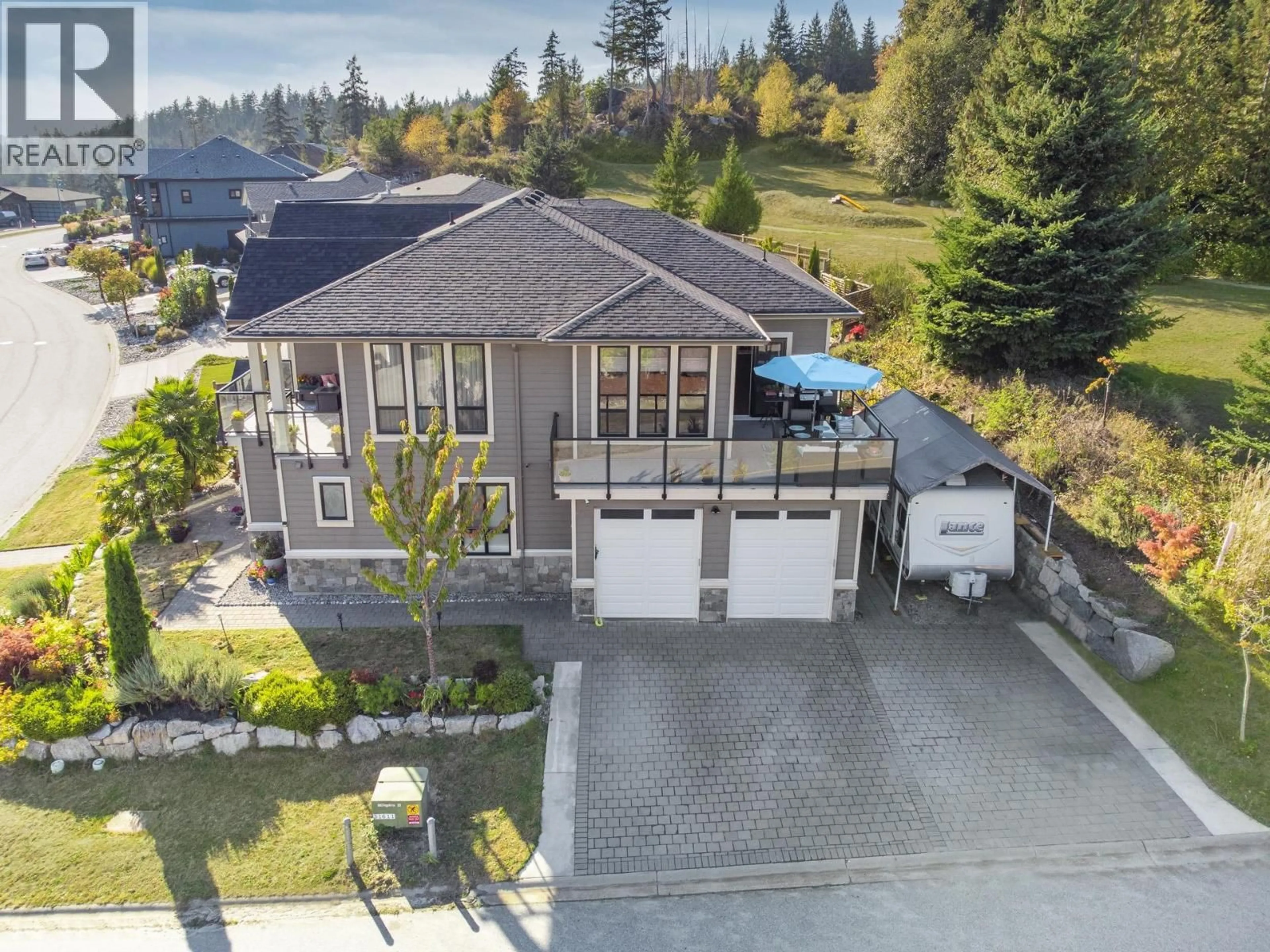 A pic from outside/outdoor area/front of a property/back of a property/a pic from drone, unknown for 5950 COMPASS LANE, Sechelt British Columbia V7Z0V1