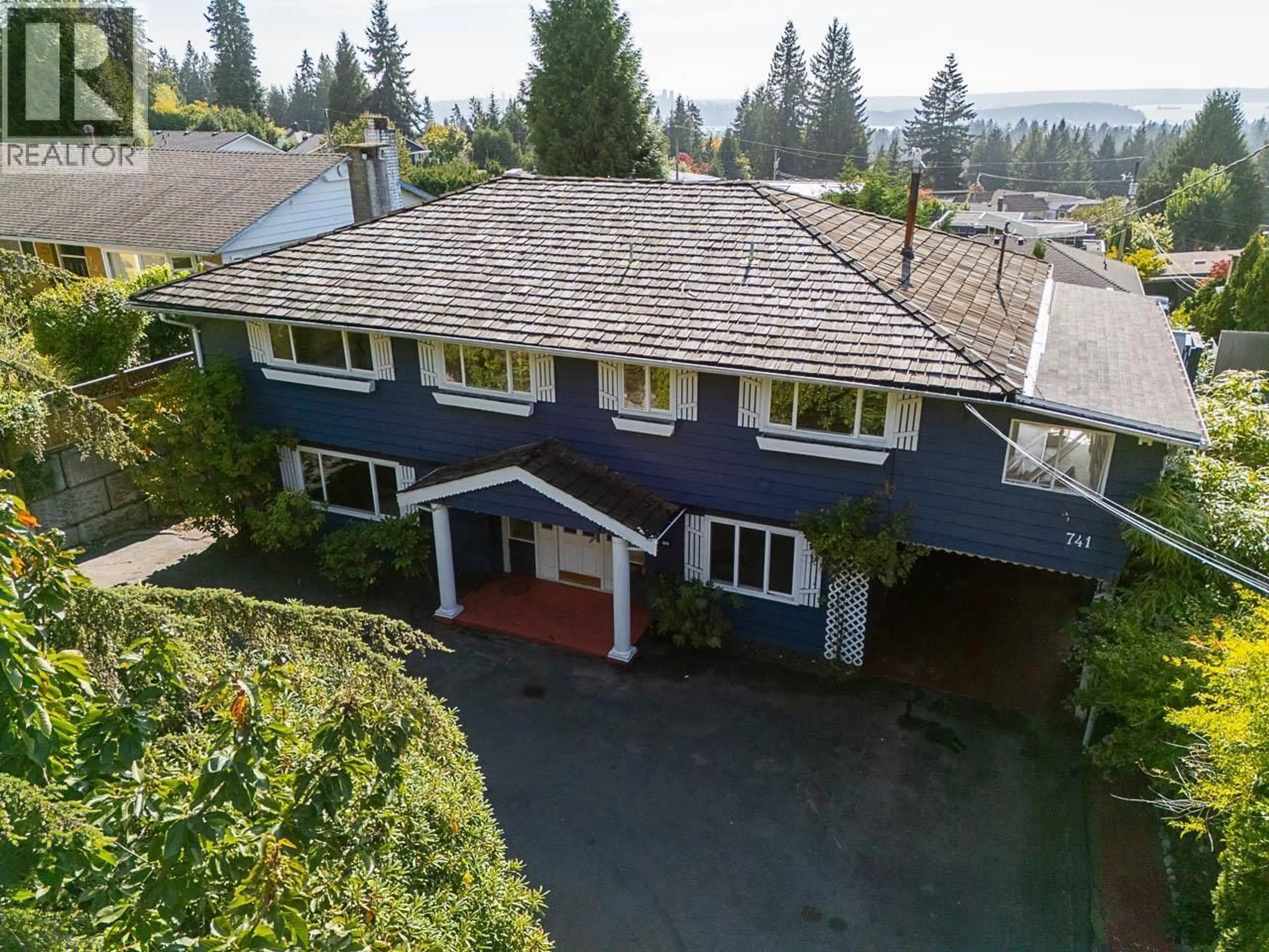 A pic from outside/outdoor area/front of a property/back of a property/a pic from drone, street for 741 MONTROYAL BOULEVARD, North Vancouver British Columbia V7R2G4