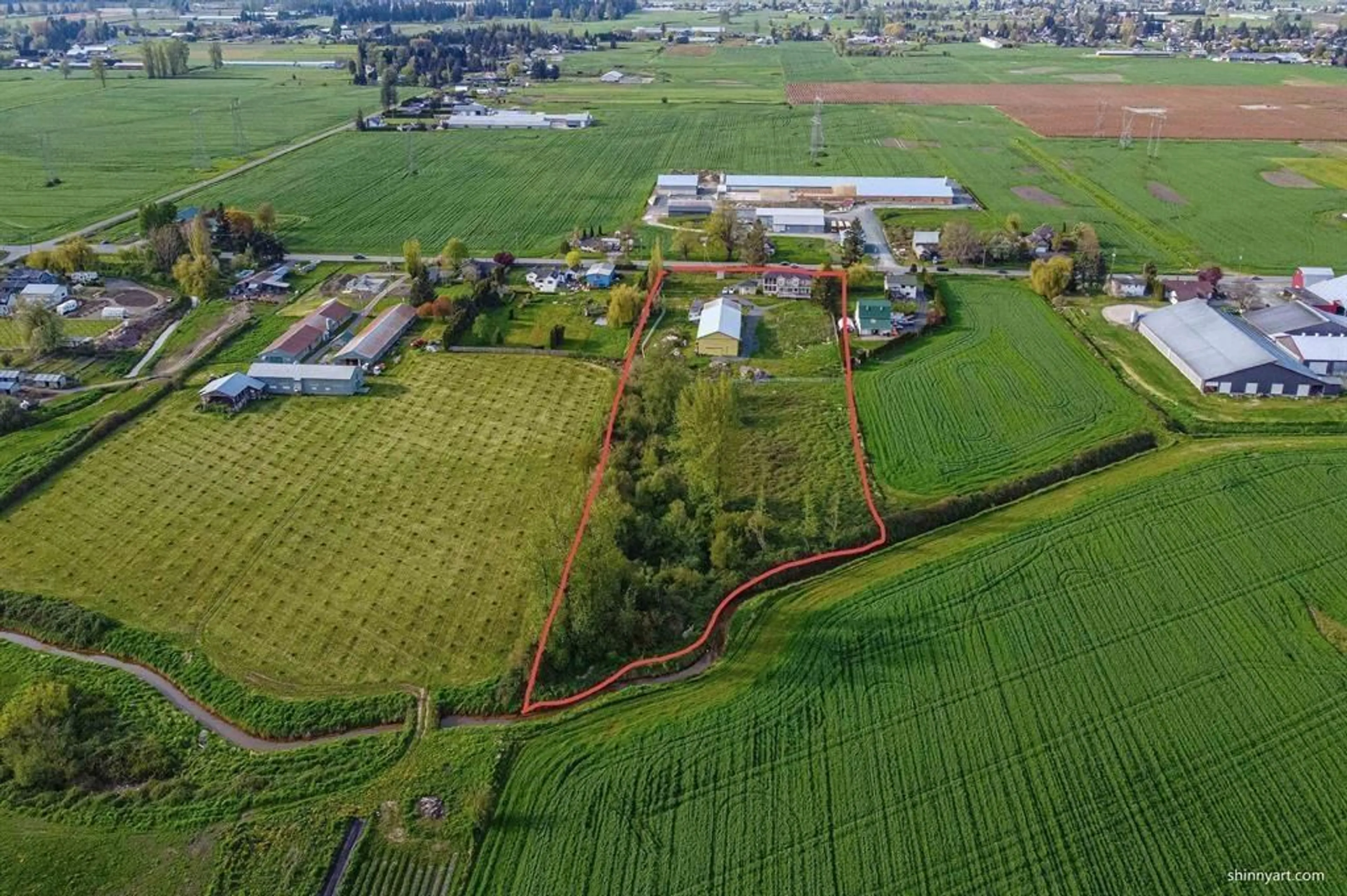 A pic from outside/outdoor area/front of a property/back of a property/a pic from drone, unknown for 42194 KEITH WILSON ROAD, Sardis - Greendale British Columbia V2R4B2