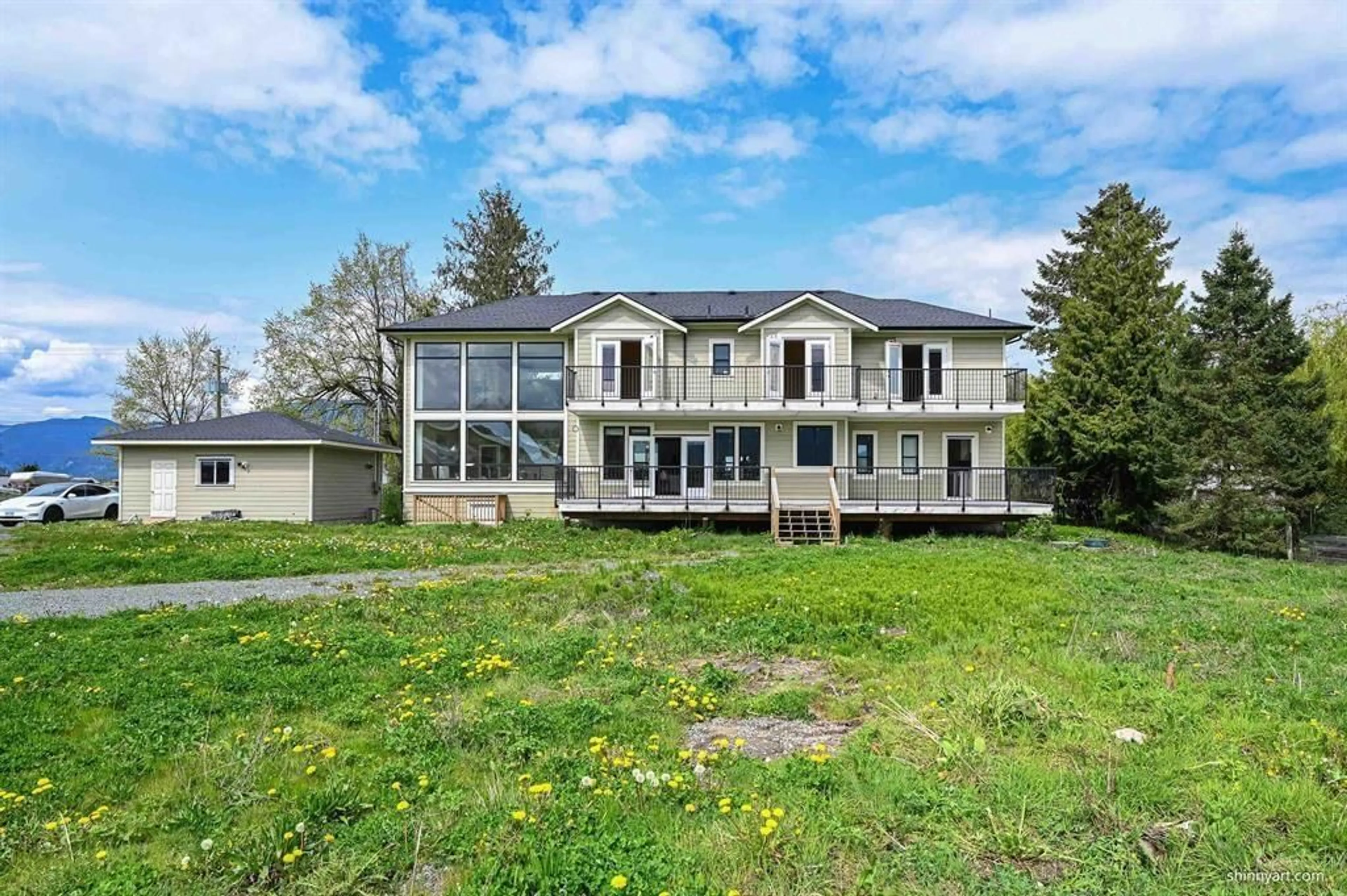A pic from outside/outdoor area/front of a property/back of a property/a pic from drone, water/lake/river/ocean view for 42194 KEITH WILSON ROAD, Sardis - Greendale British Columbia V2R4B2