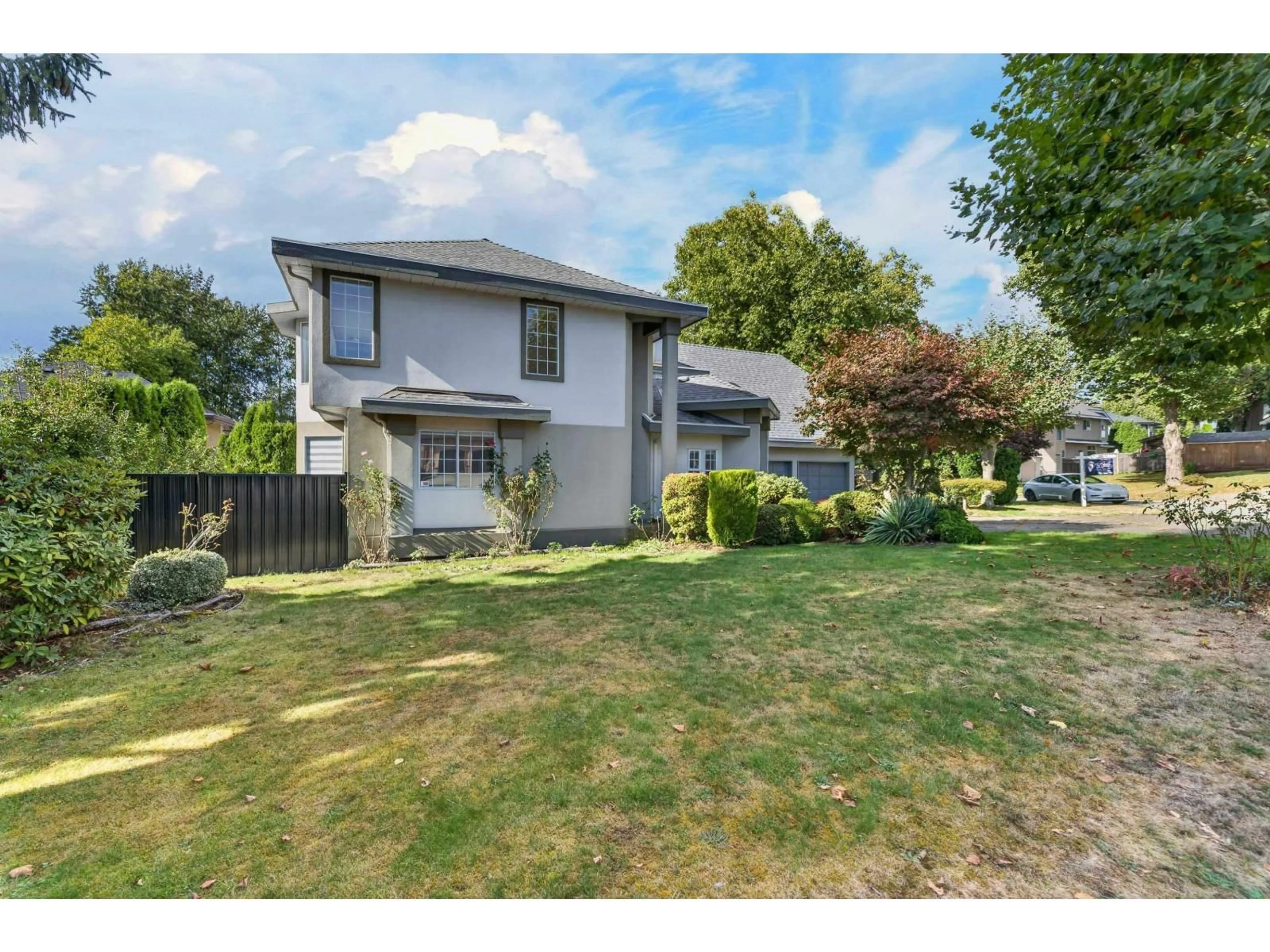 A pic from outside/outdoor area/front of a property/back of a property/a pic from drone, street for 14168 85A AVENUE, Surrey British Columbia V3W2T4