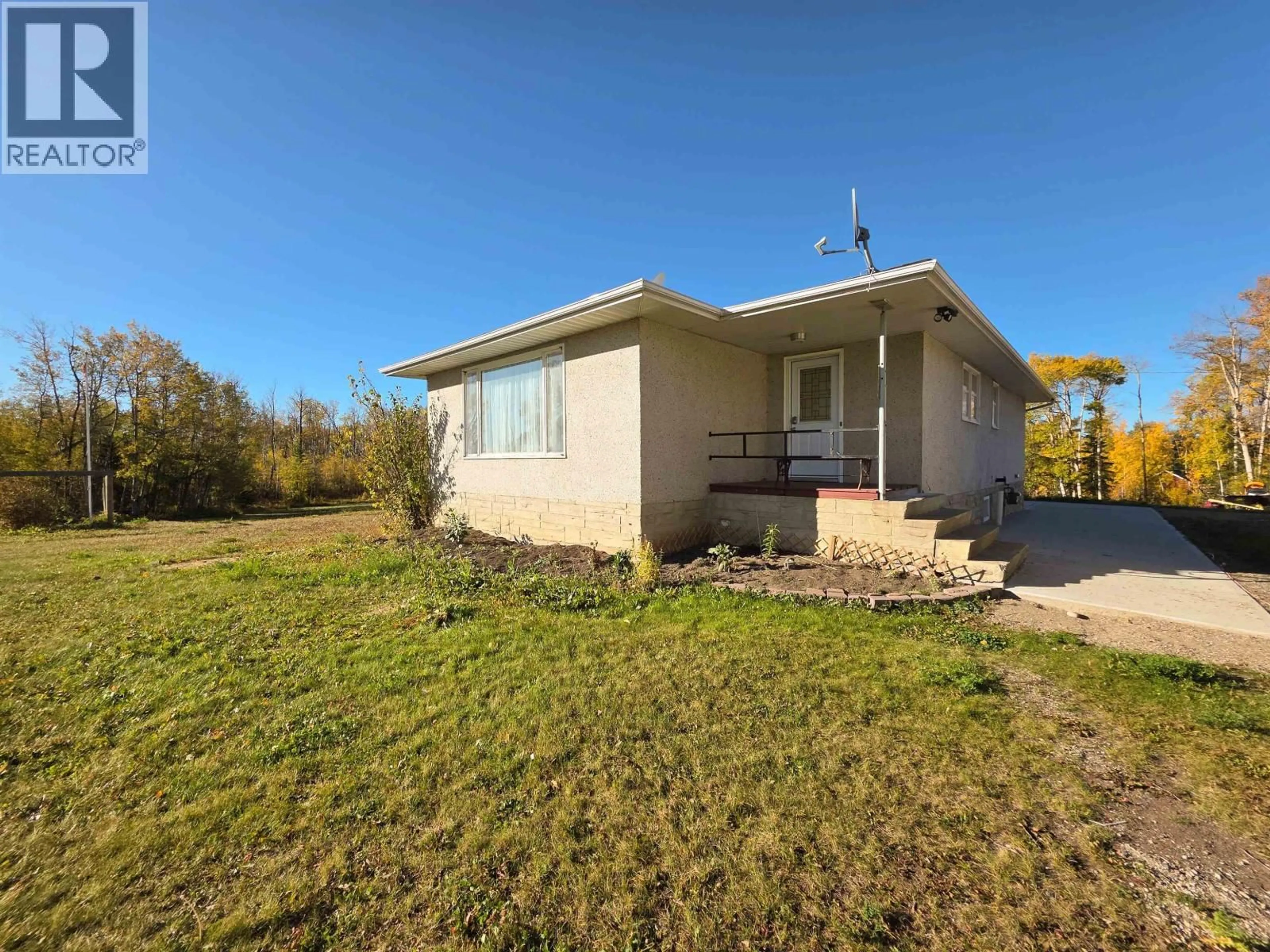 A pic from outside/outdoor area/front of a property/back of a property/a pic from drone, building for 6678 97 HIGHWAY, Fort St. John British Columbia V0C1C3