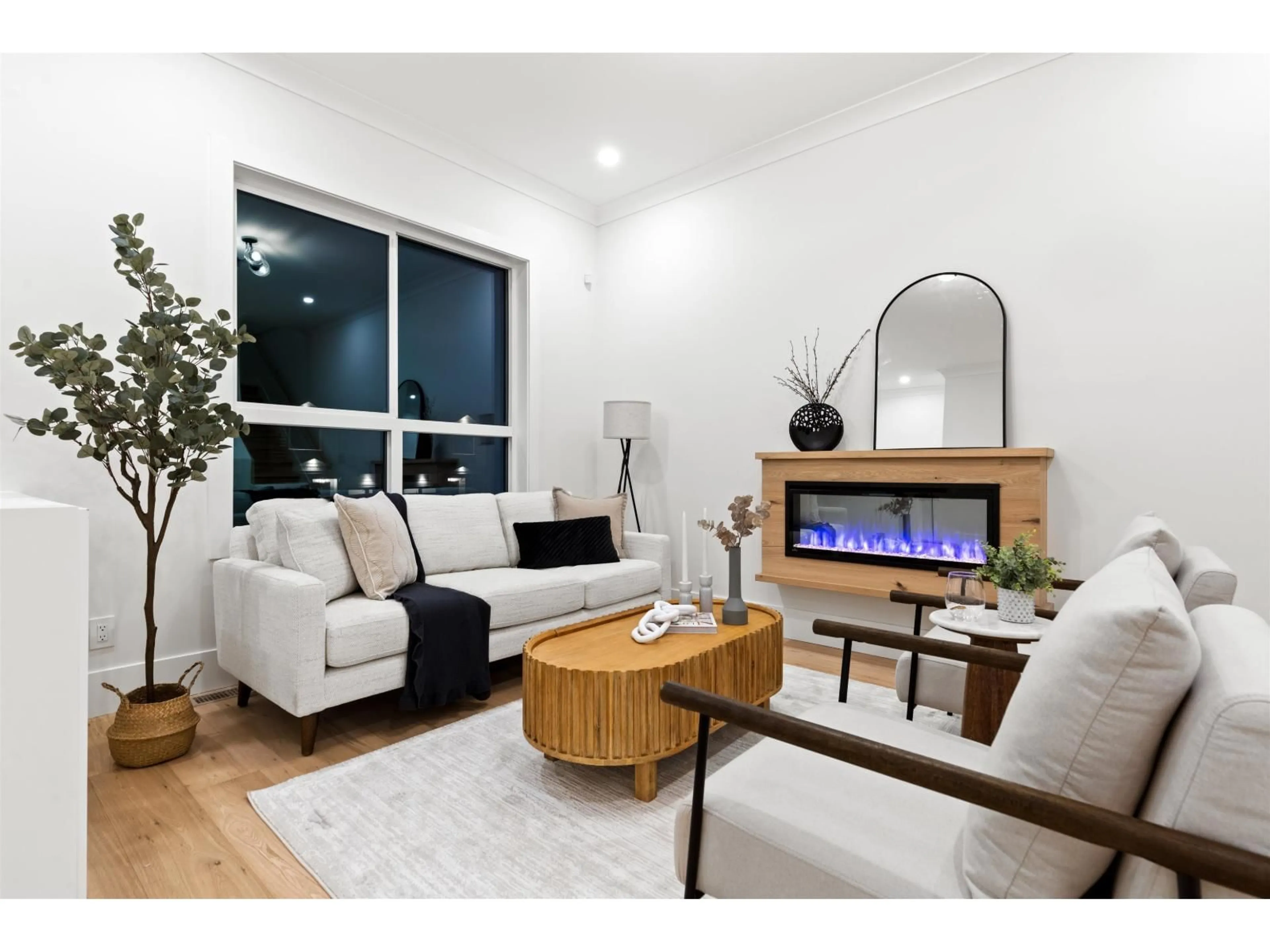Living room with furniture, wood/laminate floor for 101 - 16623 18A AVENUE, Surrey British Columbia V3Z9X5