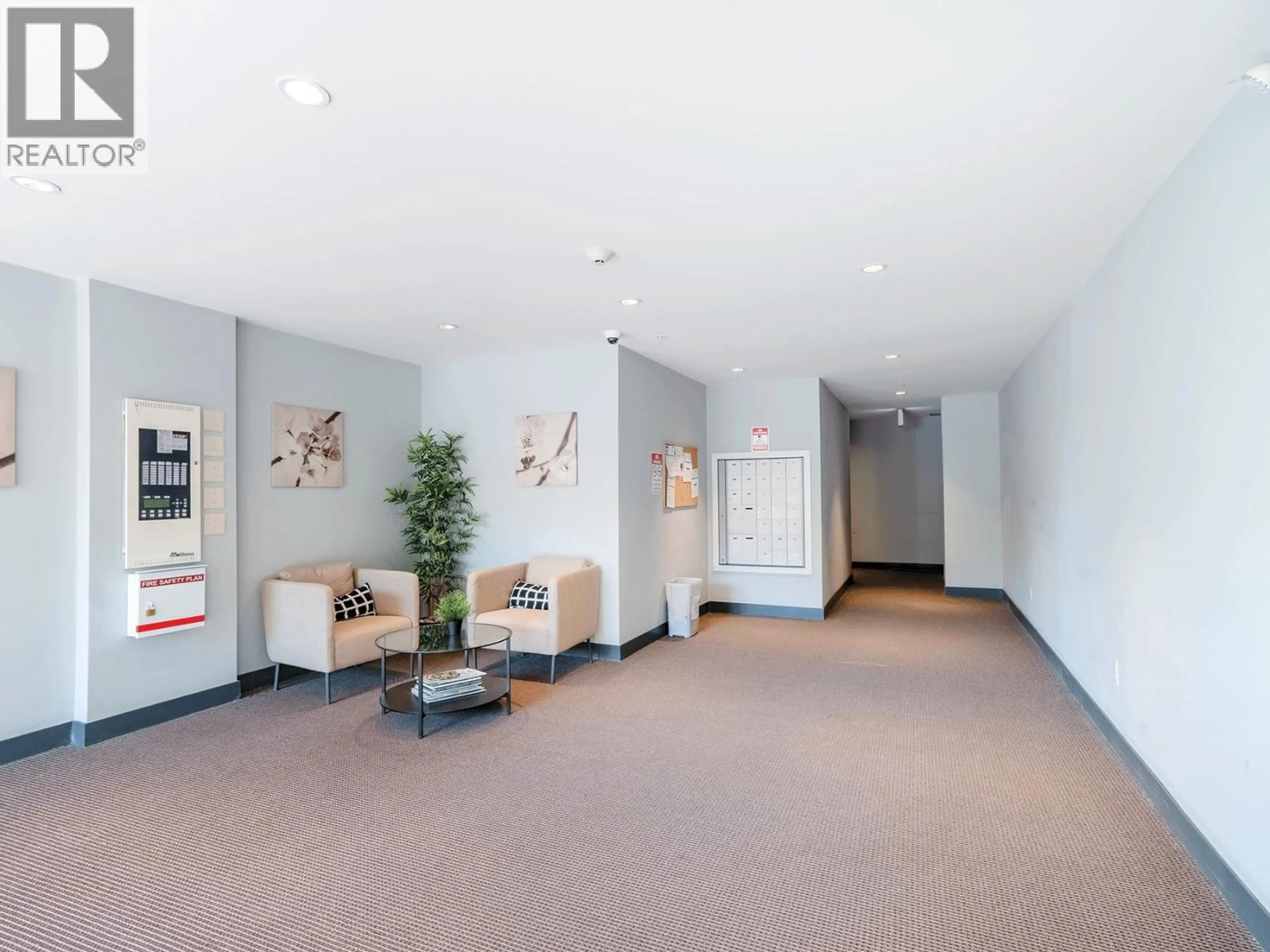 Indoor foyer for 207 - 2267 PITT RIVER ROAD, Port Coquitlam British Columbia V3C1R7